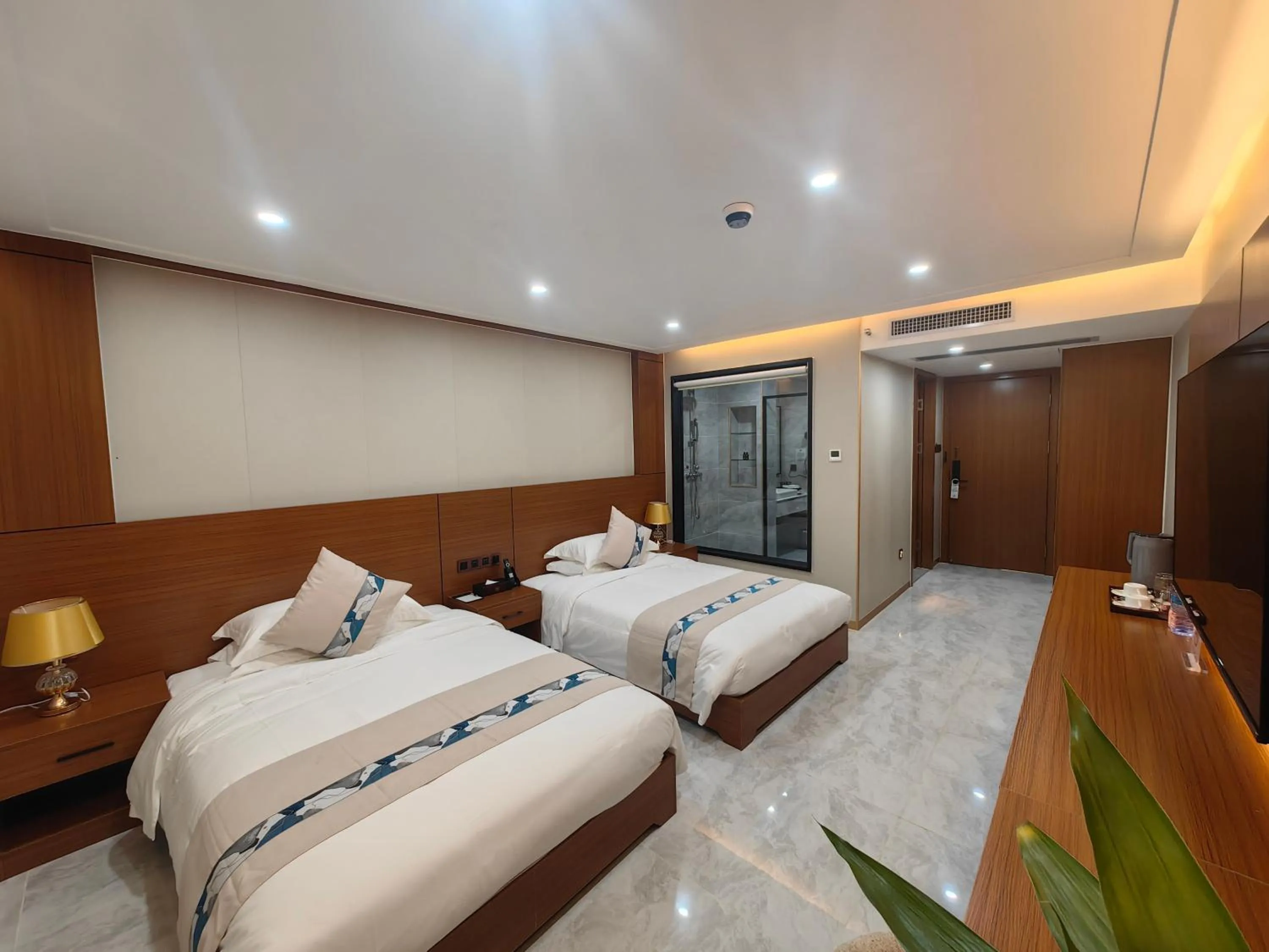 Bed in Royal International Hotel & Mall