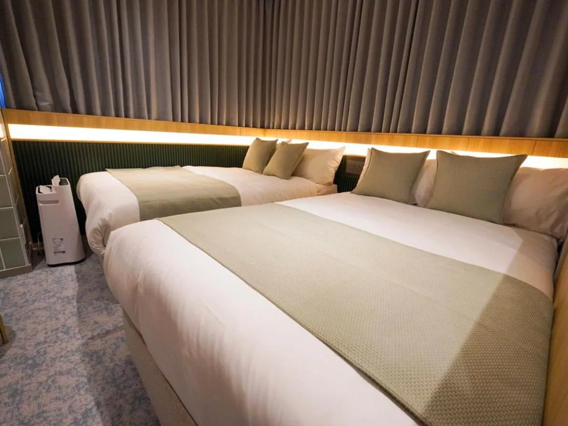 Bed in The GALA Hotel Umeda