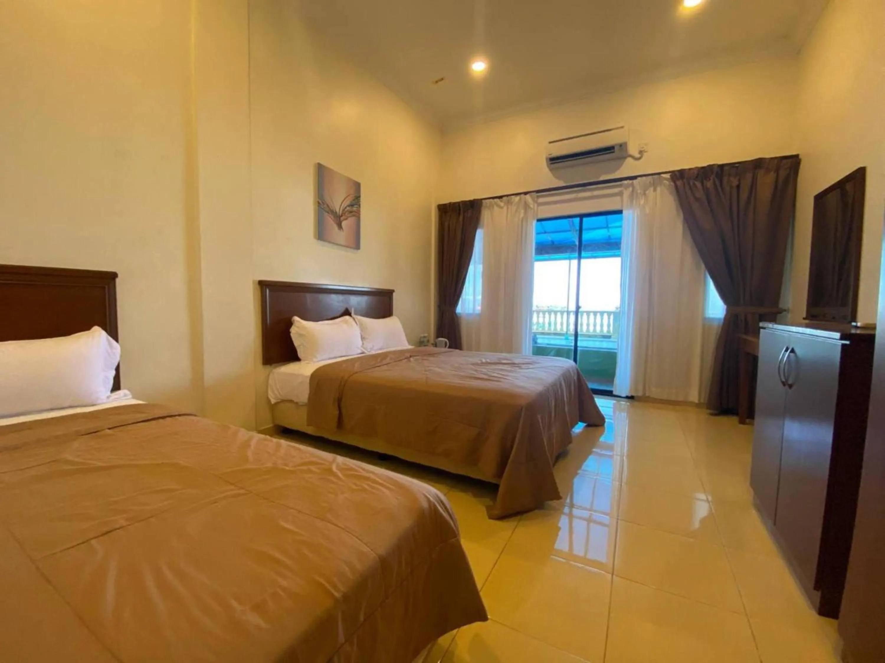 Photo of the whole room, Bed in Capital O 91094 Hotel & Chalet Sportfishing