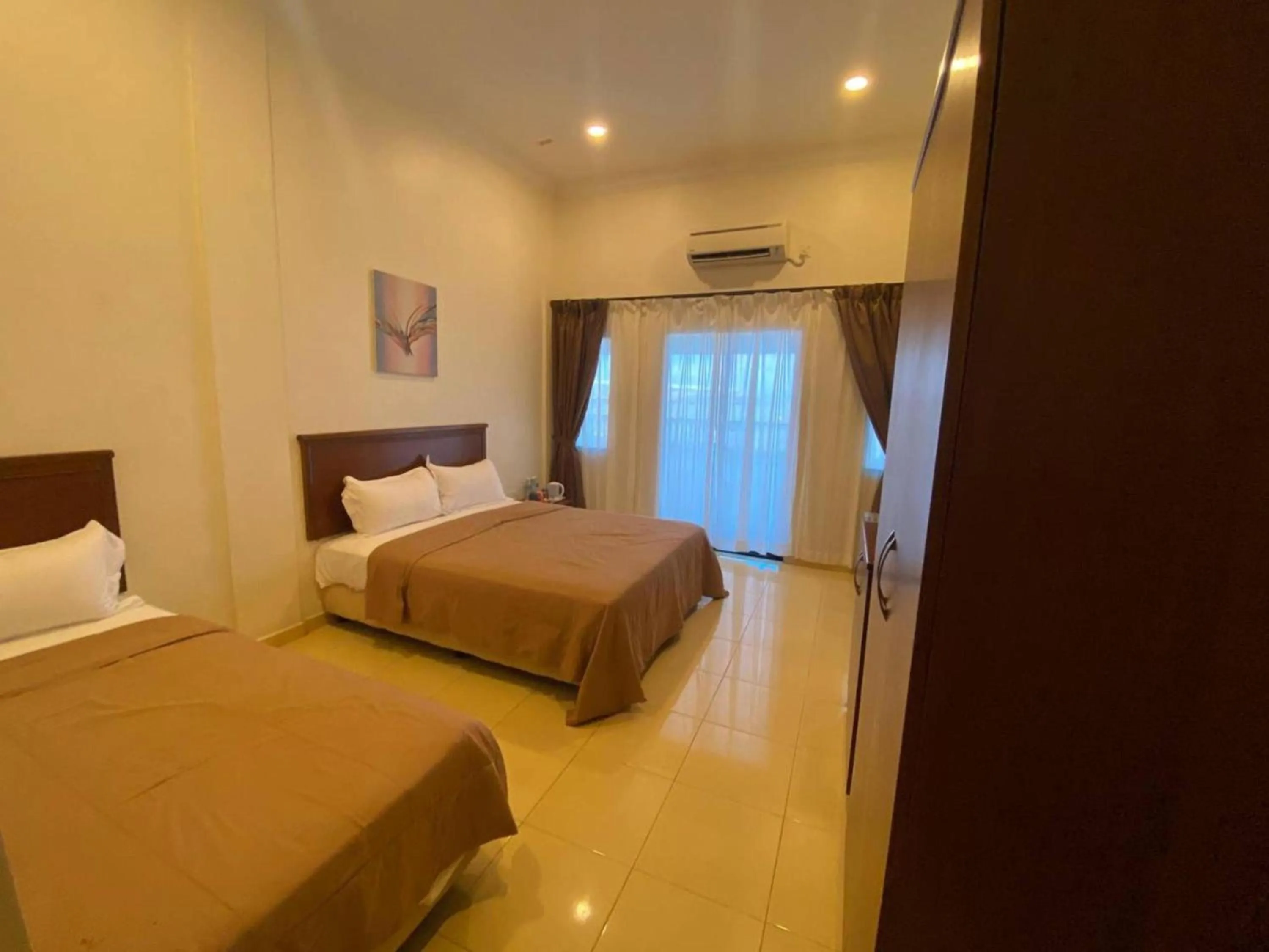 View (from property/room), Bed in Capital O 91094 Hotel & Chalet Sportfishing