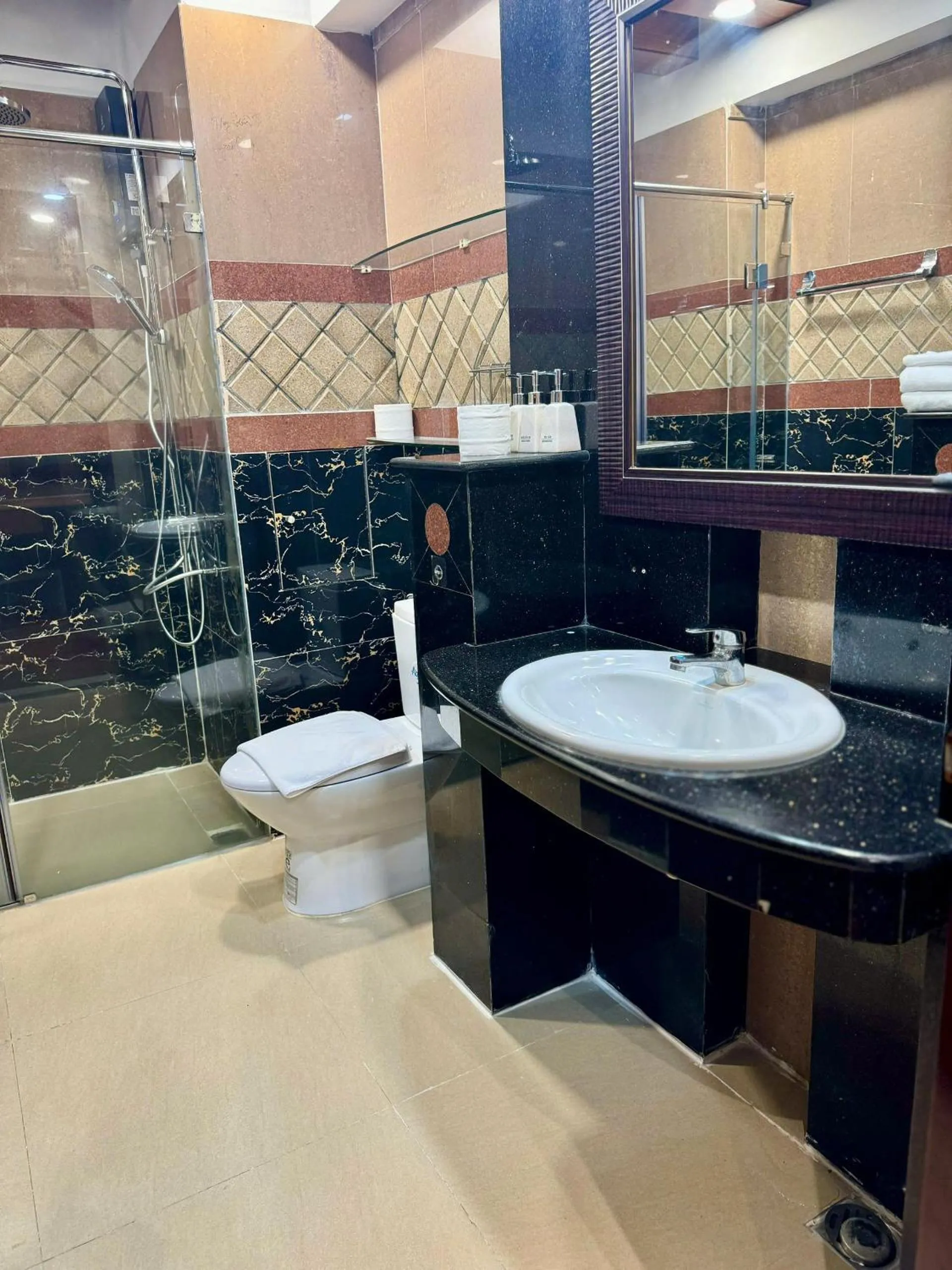 Toilet in Bros Citihouse Hotel