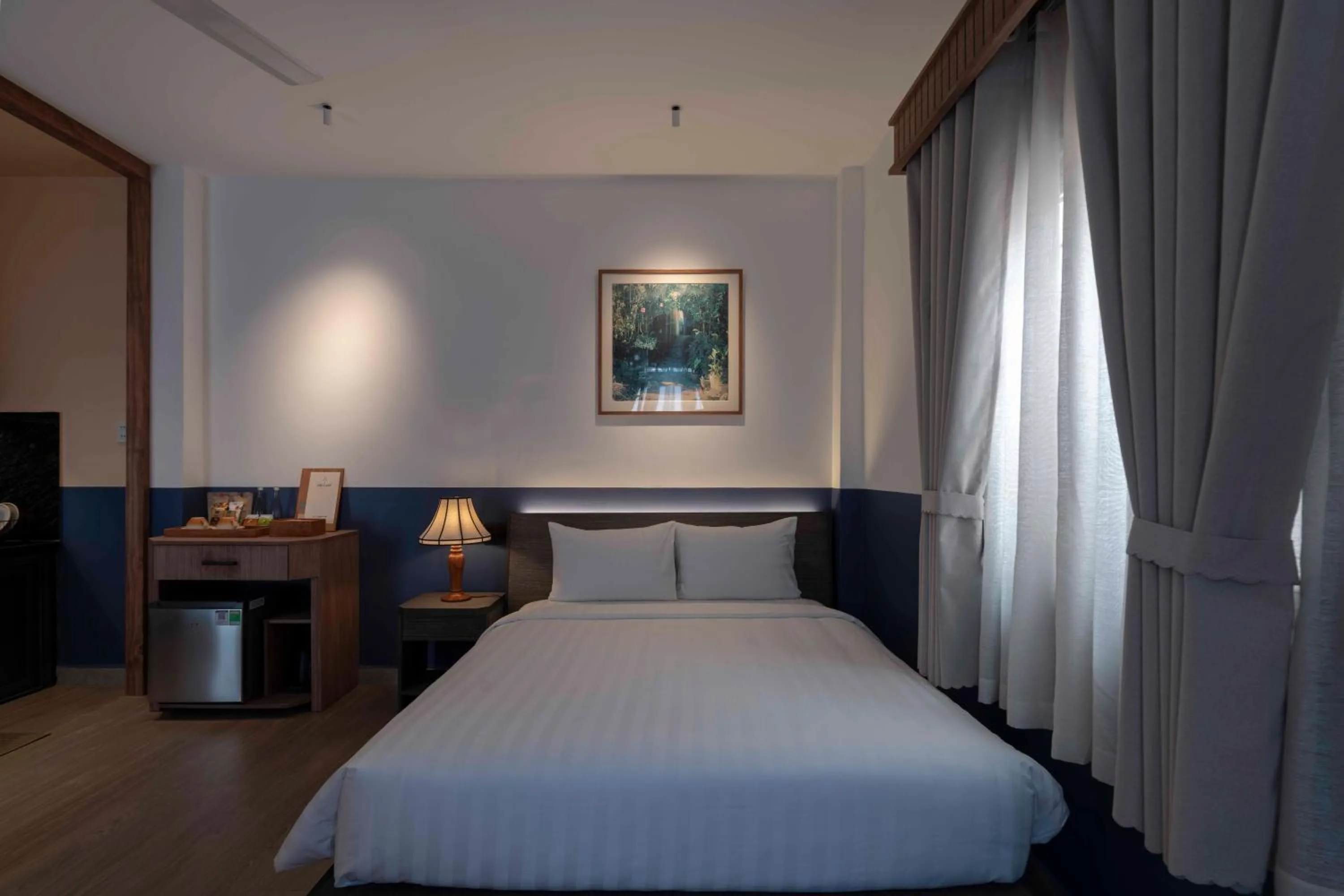 Bed in The Lamp Boutique House