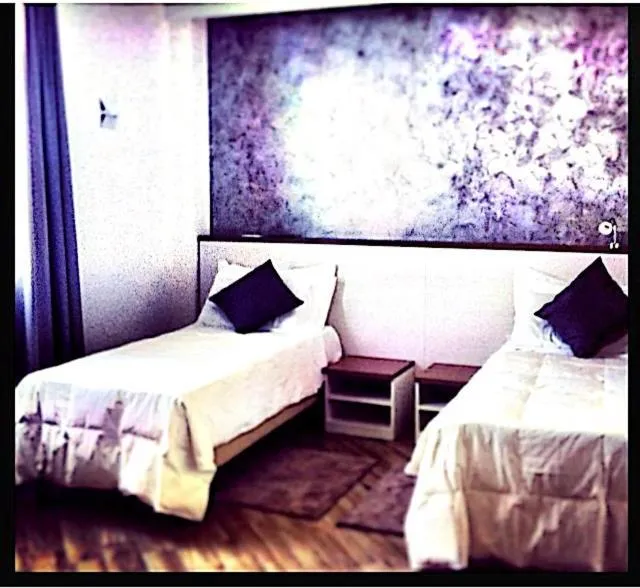 Property building, Bed in BHL Boutique Rooms Legnano