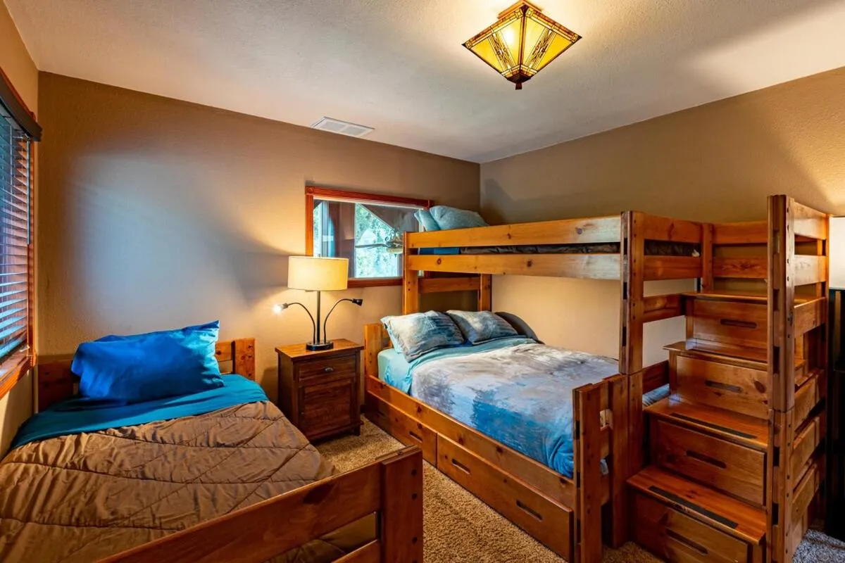 Bed in Waterfall Lodge near Yosemite Endless Pool, Hot Tub, Playground