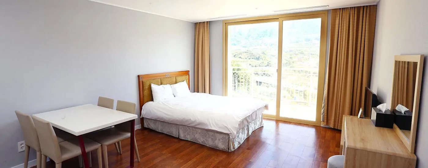 Bed in The K Jirisan Family Hotel