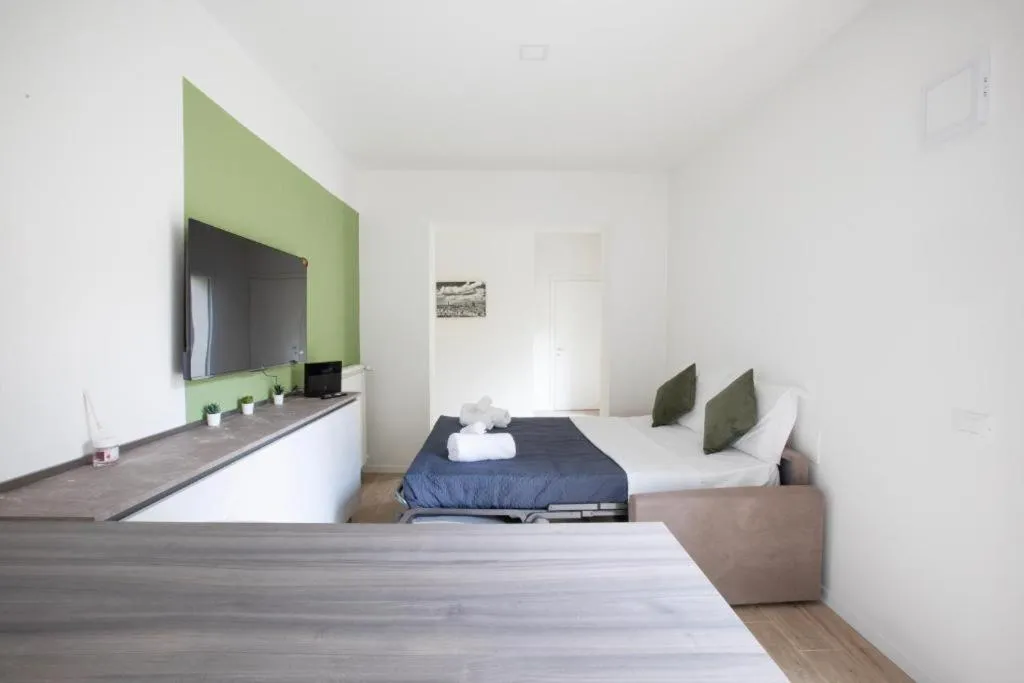 Bed in Relais Lavagnini Florence