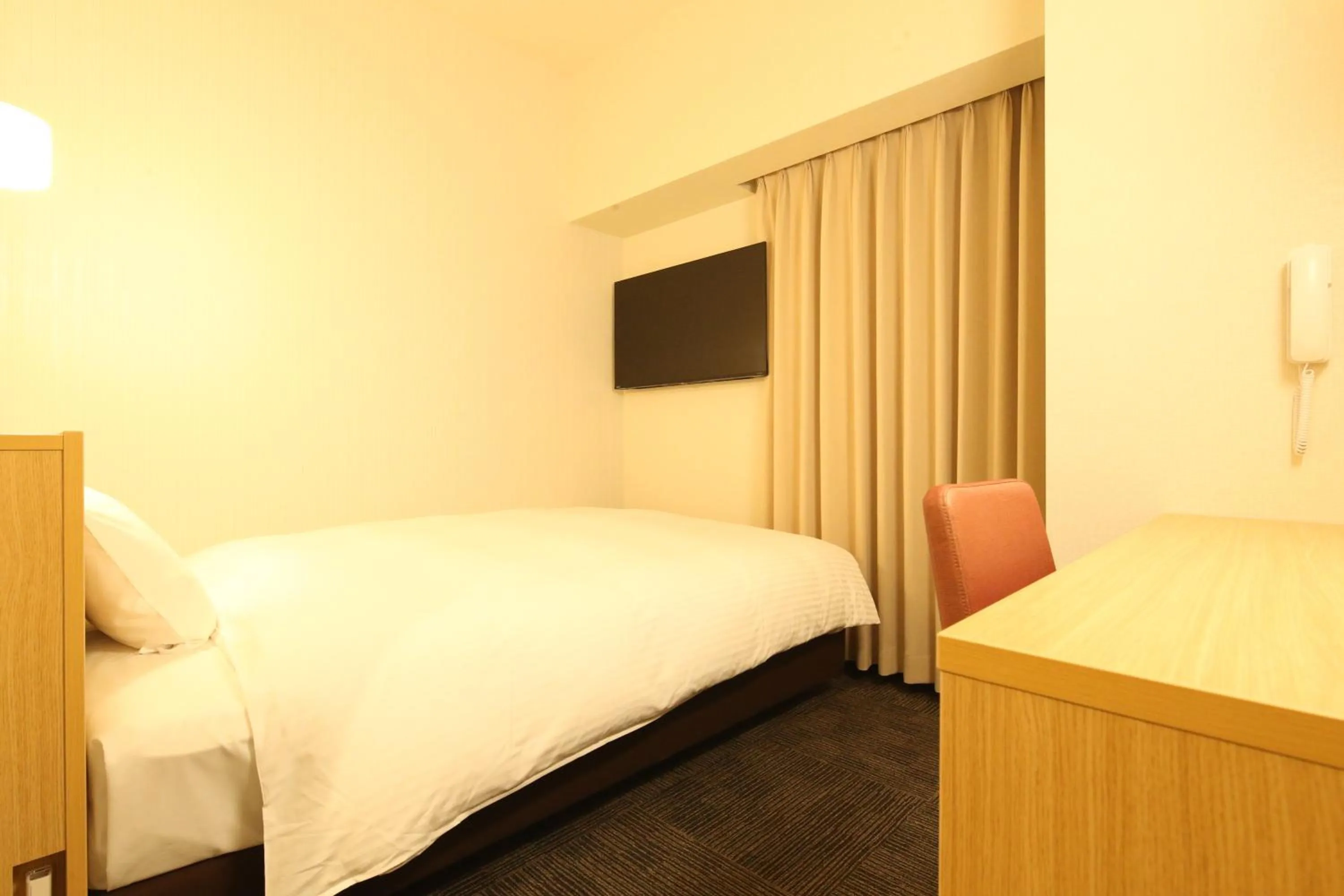 Bed in AB Hotel Anjo