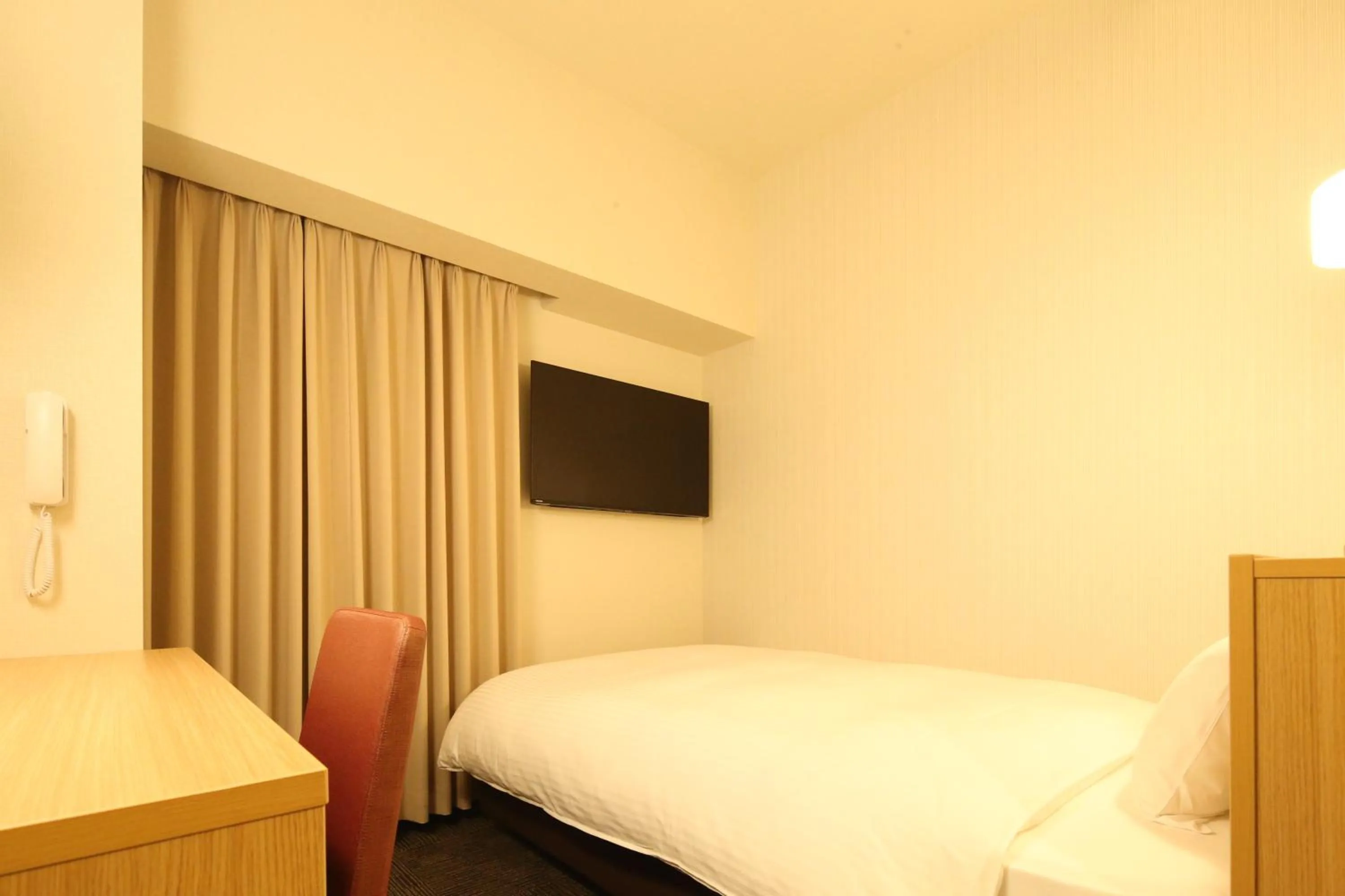 Bed in AB Hotel Anjo