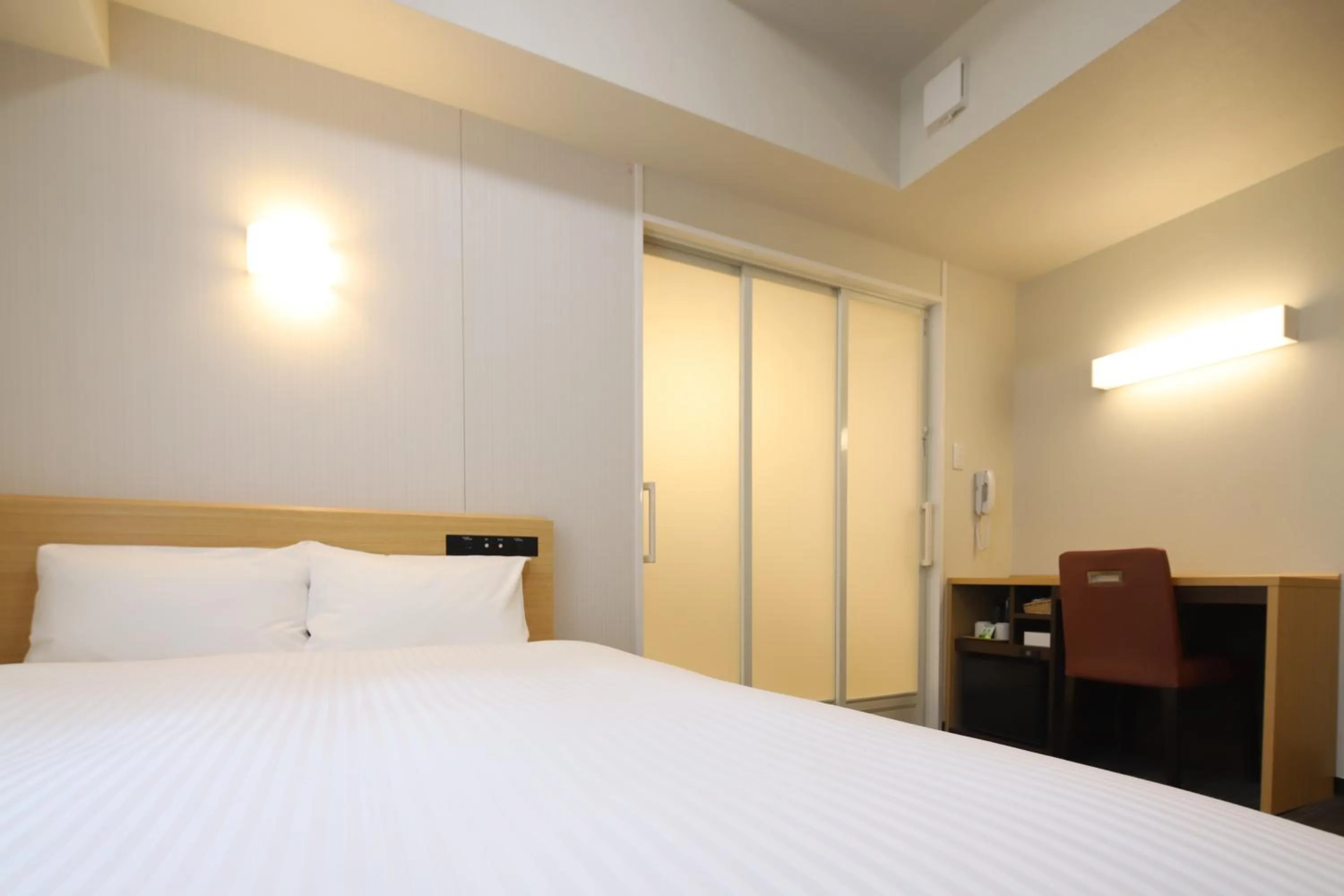 Bed in AB Hotel Anjo