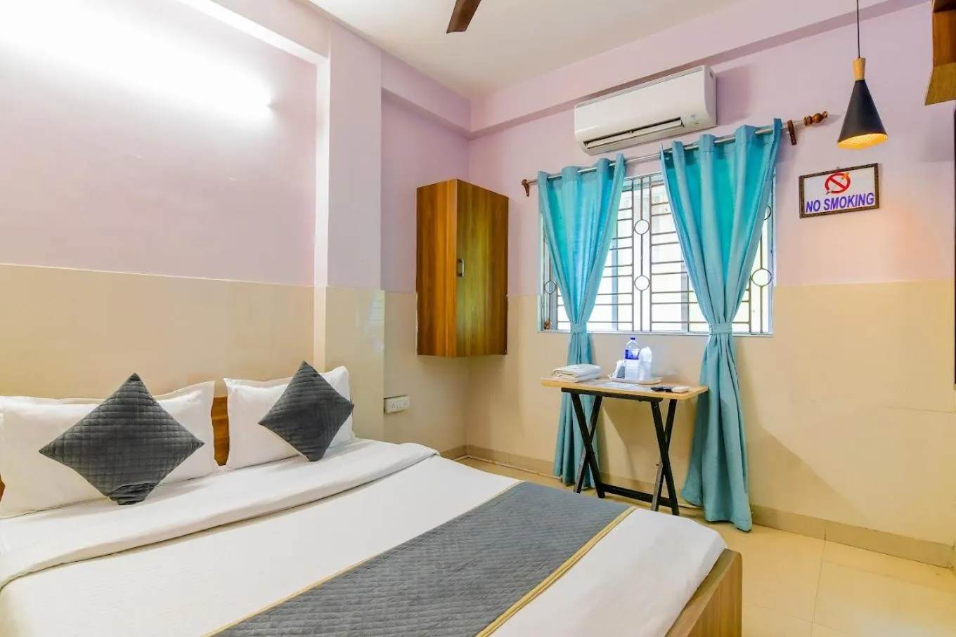 Bed in The Kolkata Hotel