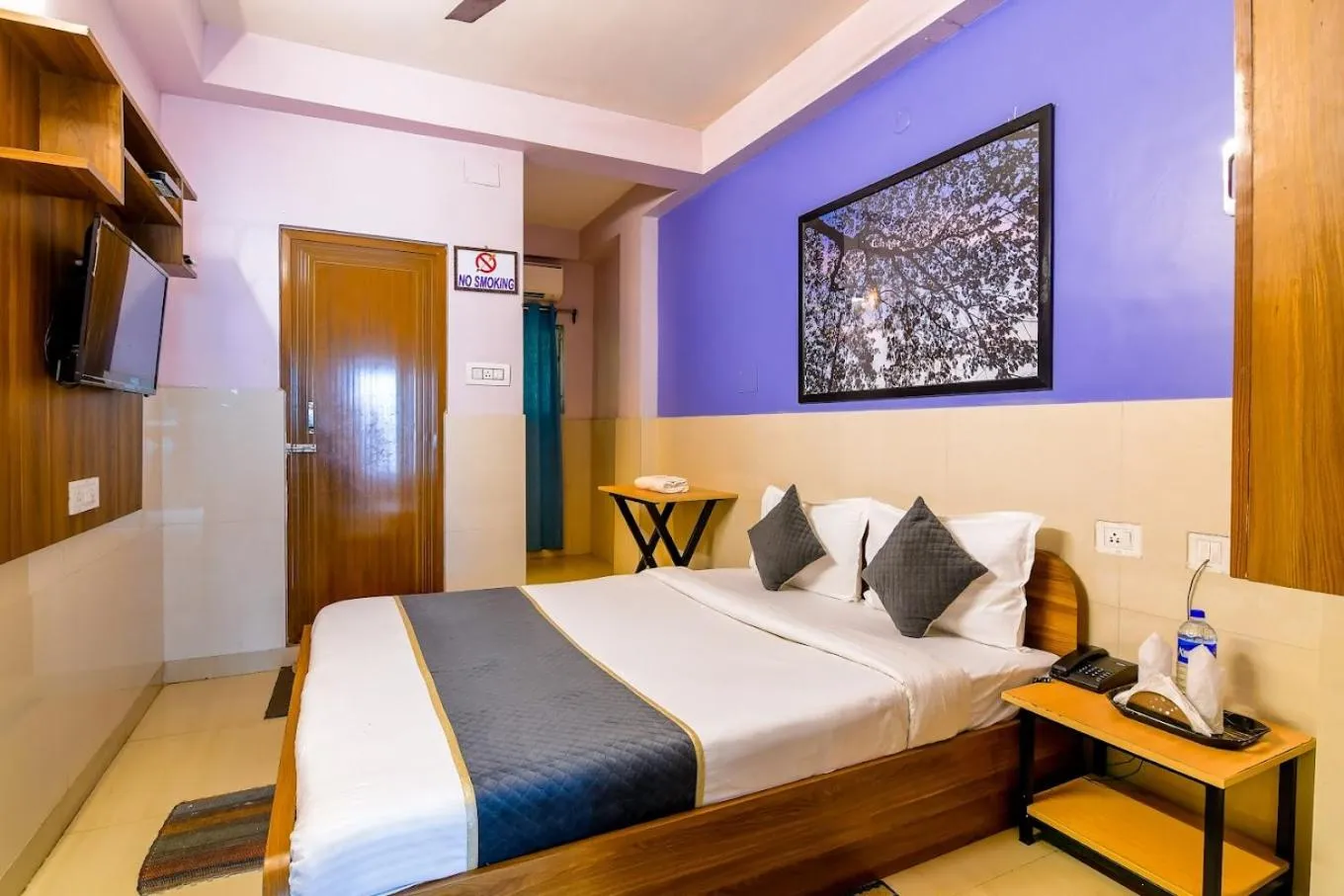 Bed in The Kolkata Hotel