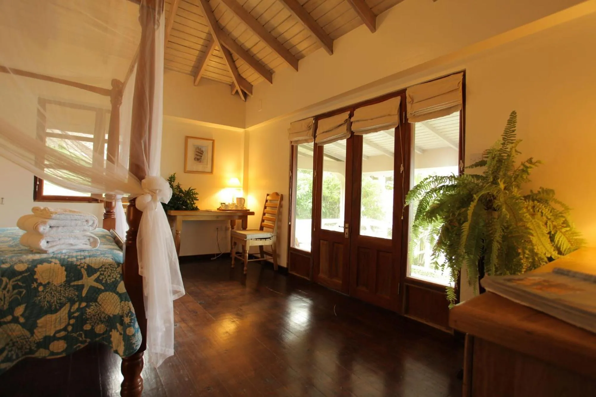 Bedroom, Bed in Petite Anse Hotel