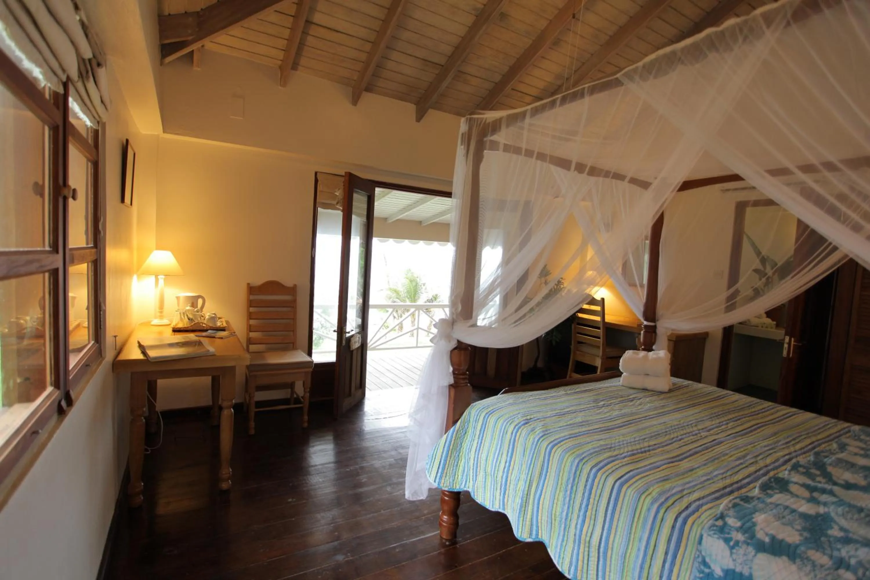Bedroom, Bed in Petite Anse Hotel