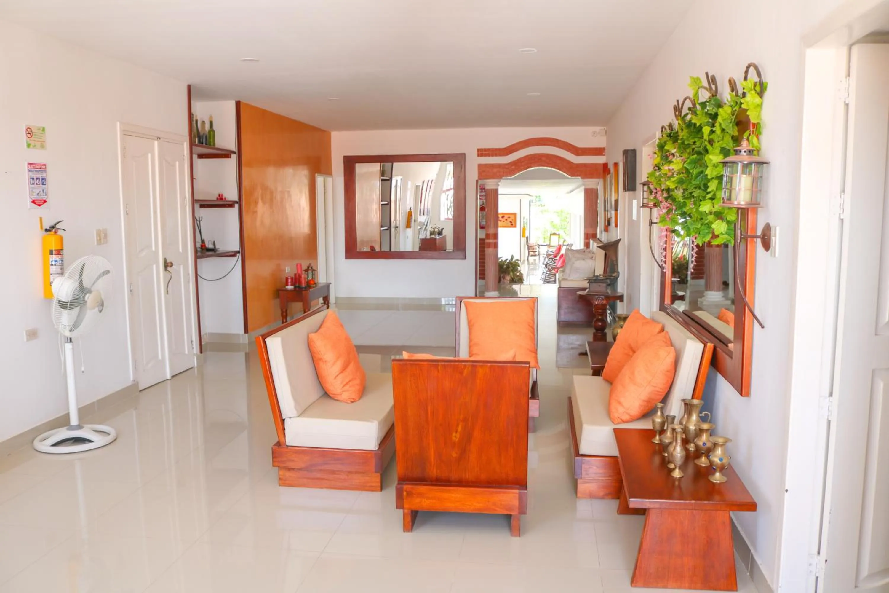 Living room in Hotel Jardines Evans By GEH Suites