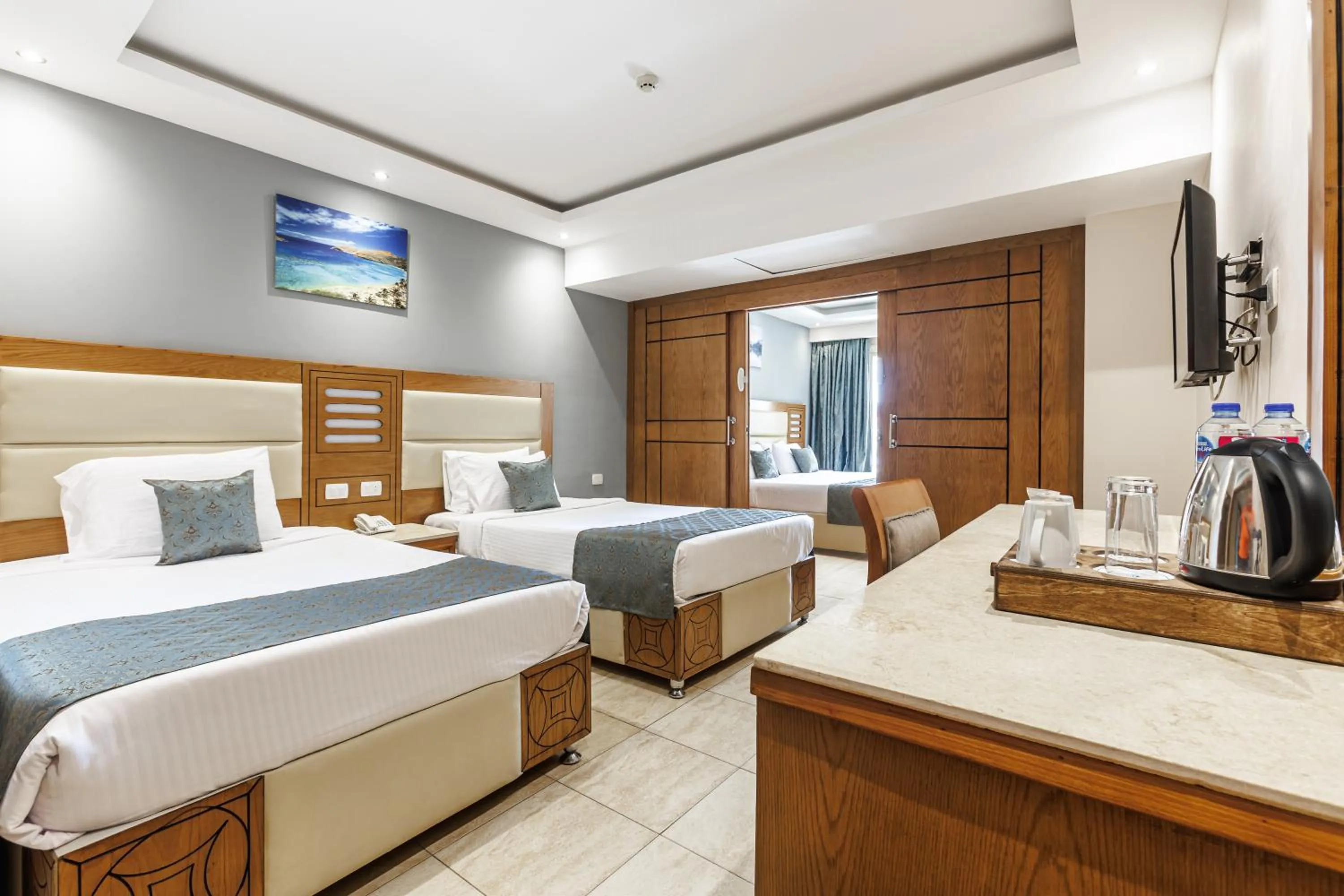 Bed in Sunrise Alora Aqua Park Resort