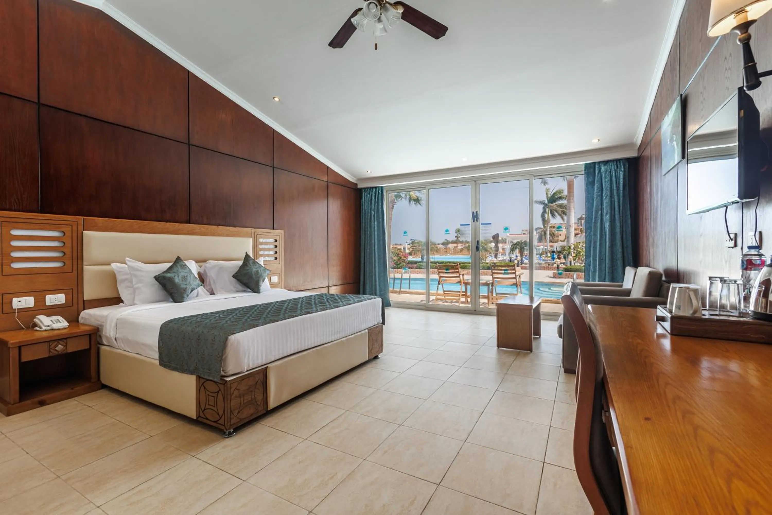 Bed in Sunrise Alora Aqua Park Resort