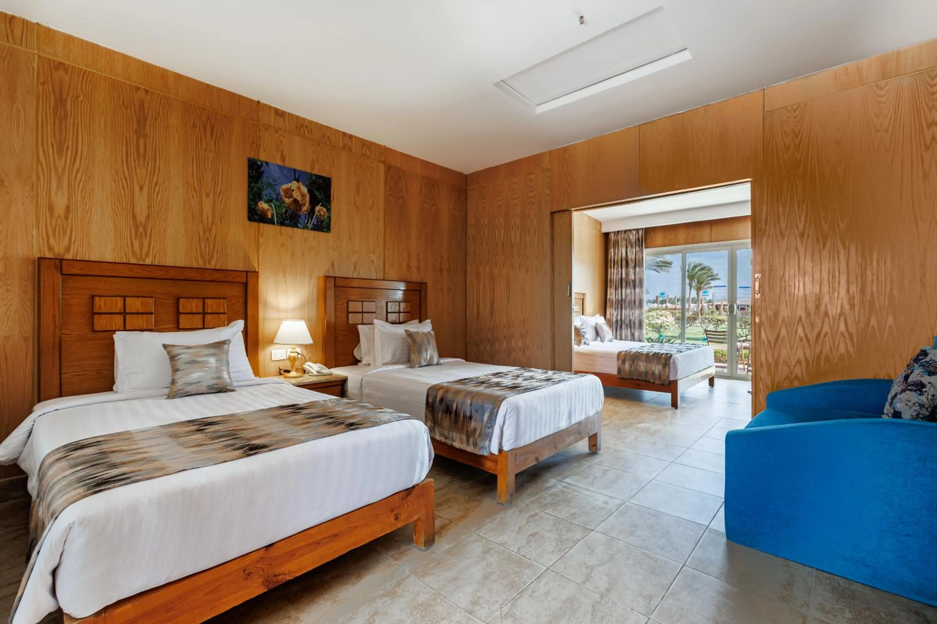 Bed in Sunrise Alora Aqua Park Resort