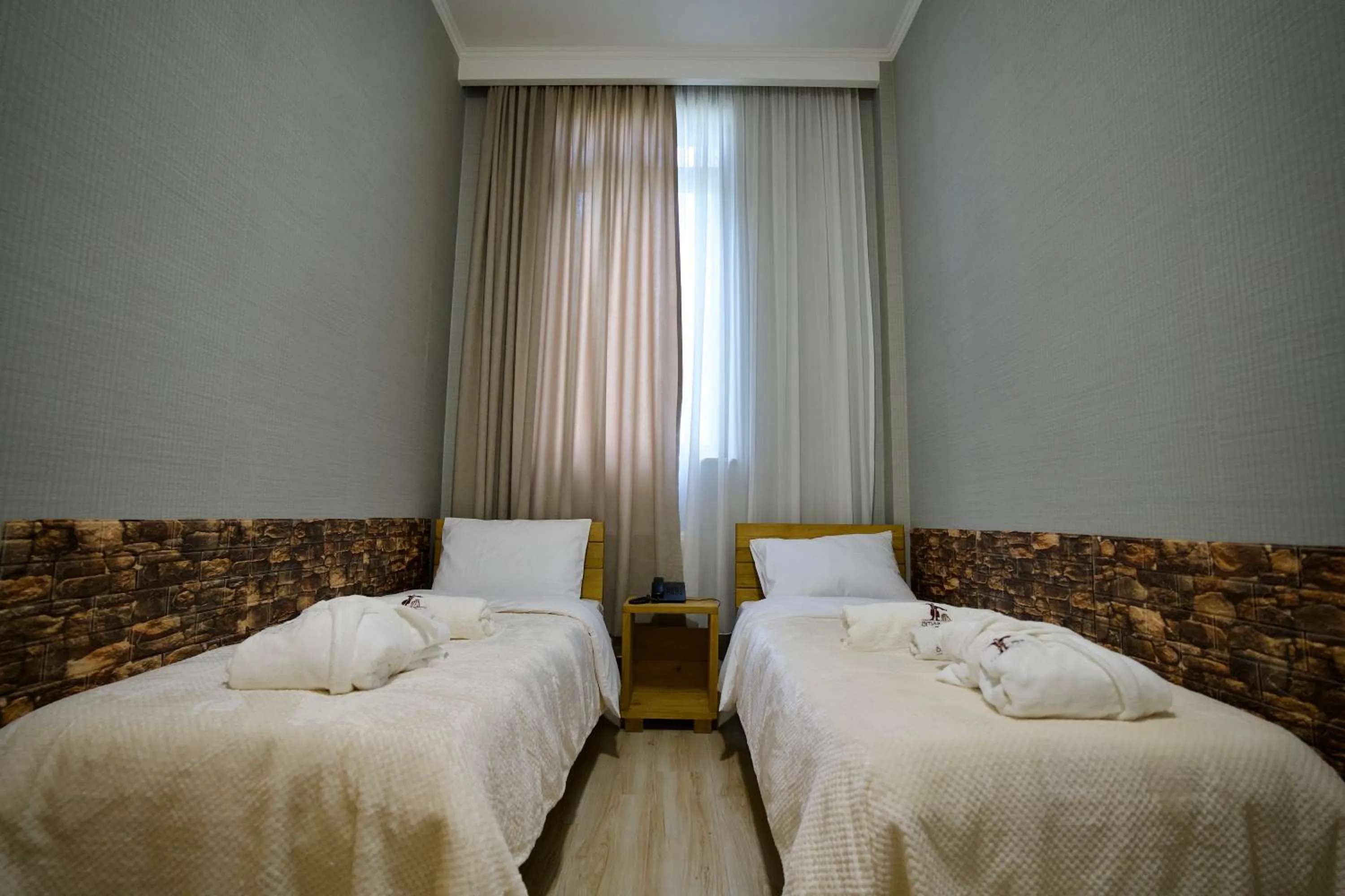 Bed in Hotel Mogzauri