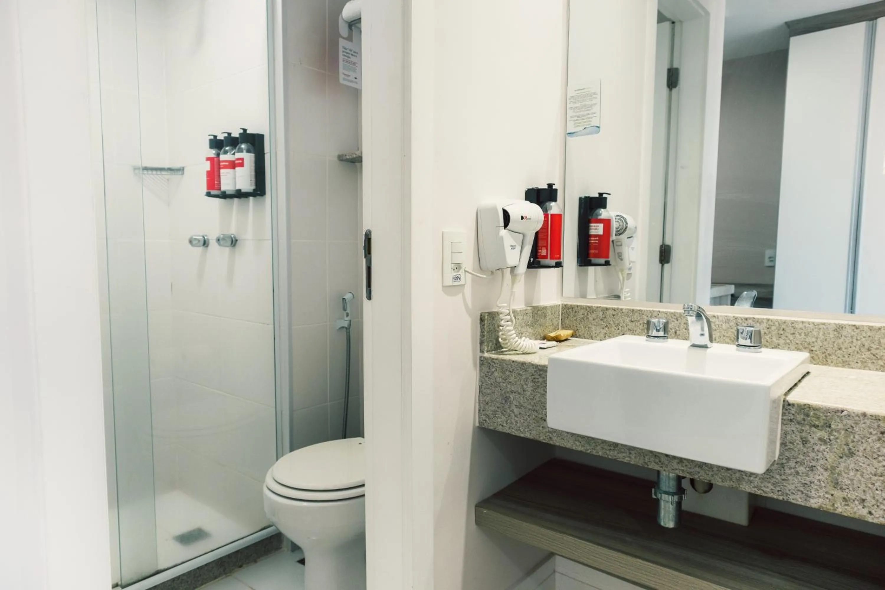 Bathroom in Ramada Hotel & Suites Campos Pelinca