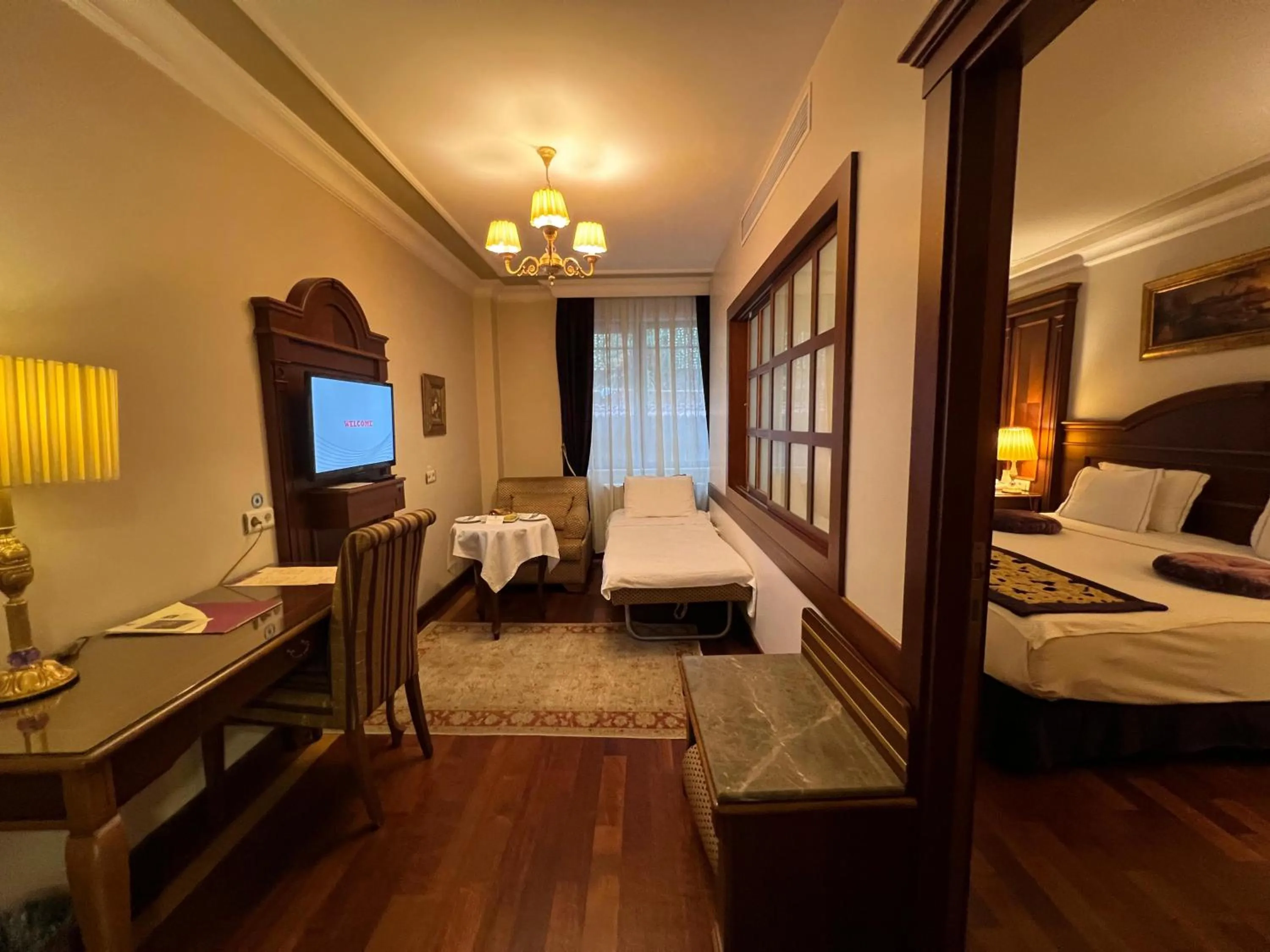 Photo of the whole room, Bed in GLK PREMIER Regency Suites & Spa