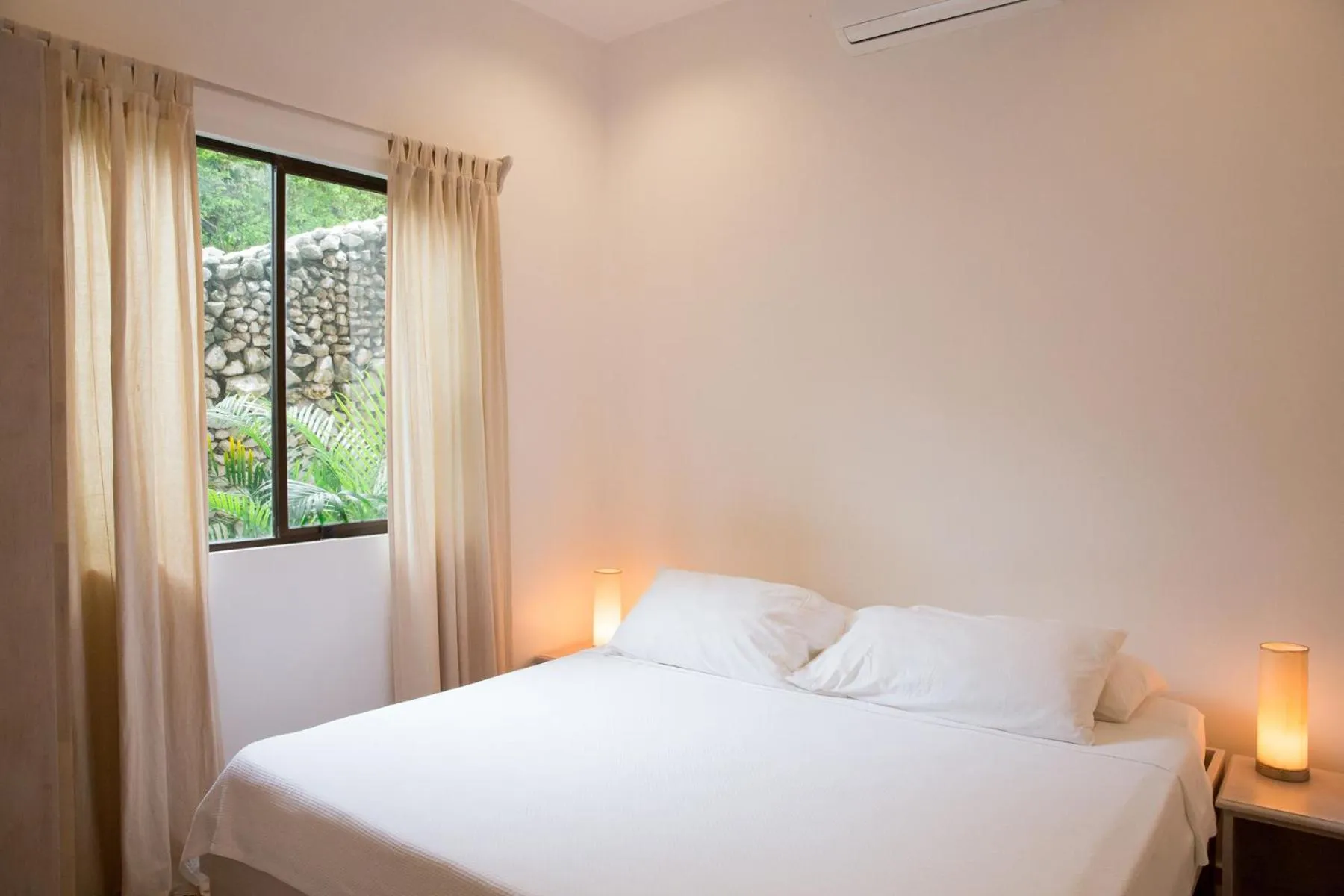 Bed in Bodhi Tree Yoga Resort