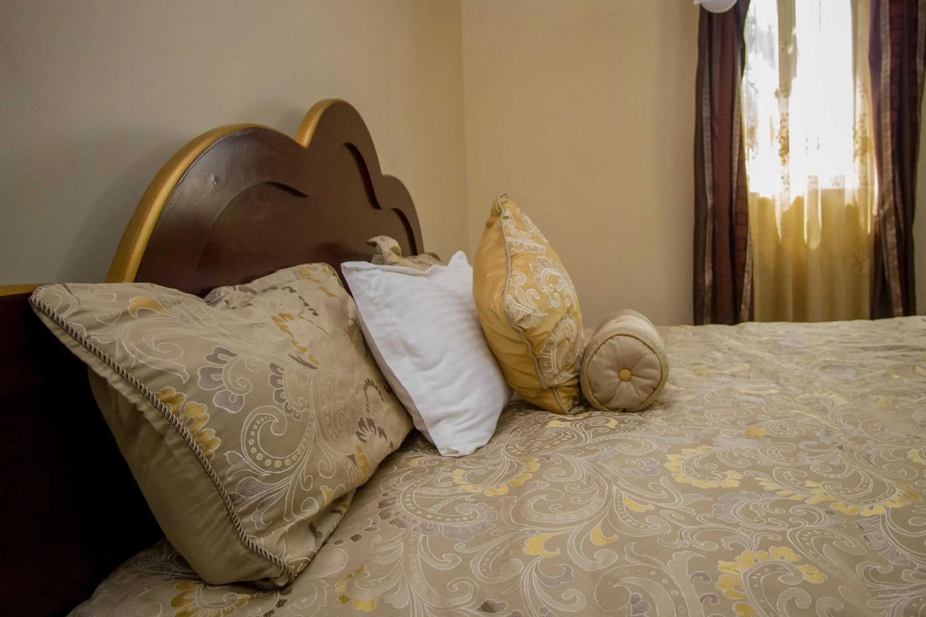 Bed in Grand Global Hotel