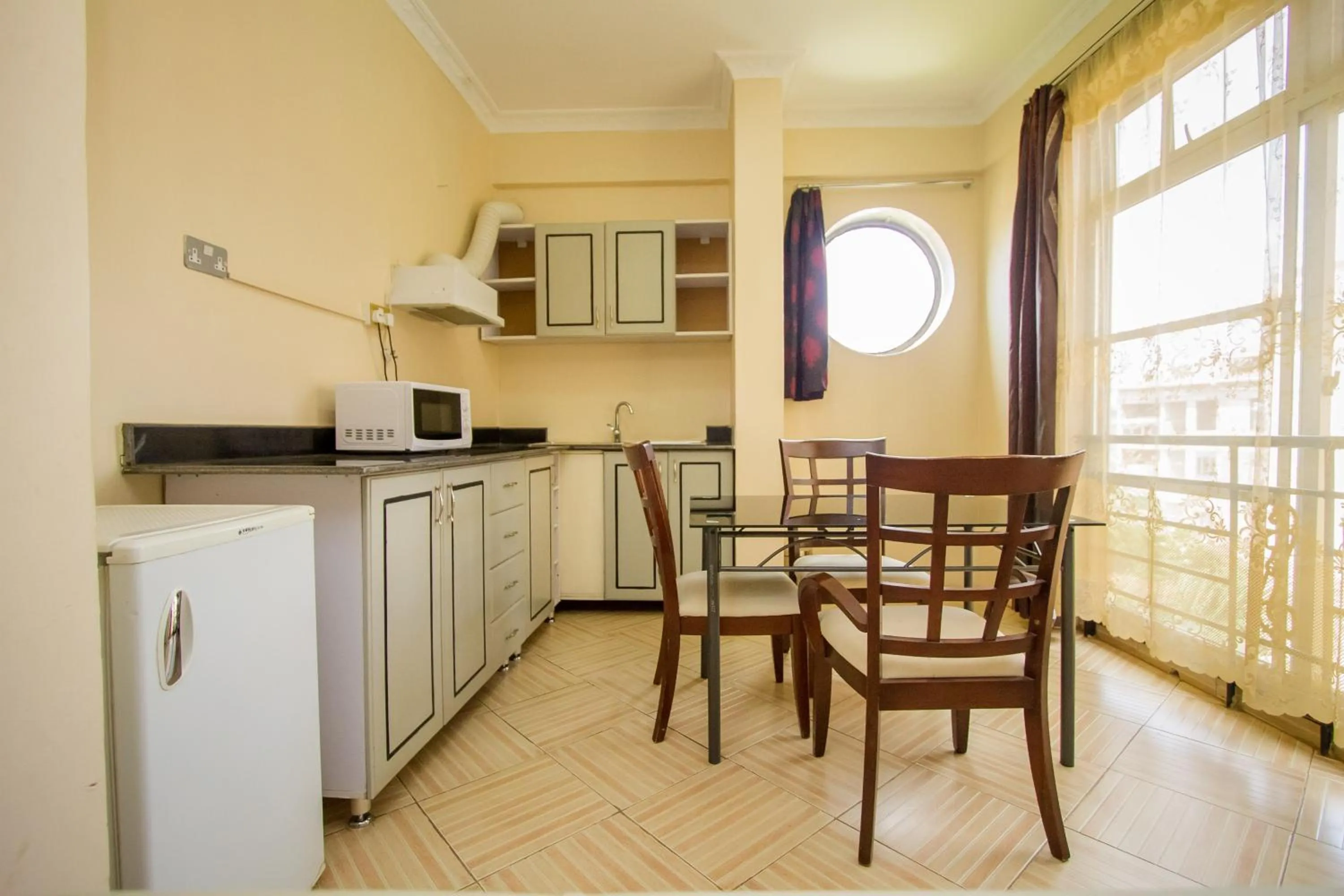 Kitchen or kitchenette in Grand Global Hotel