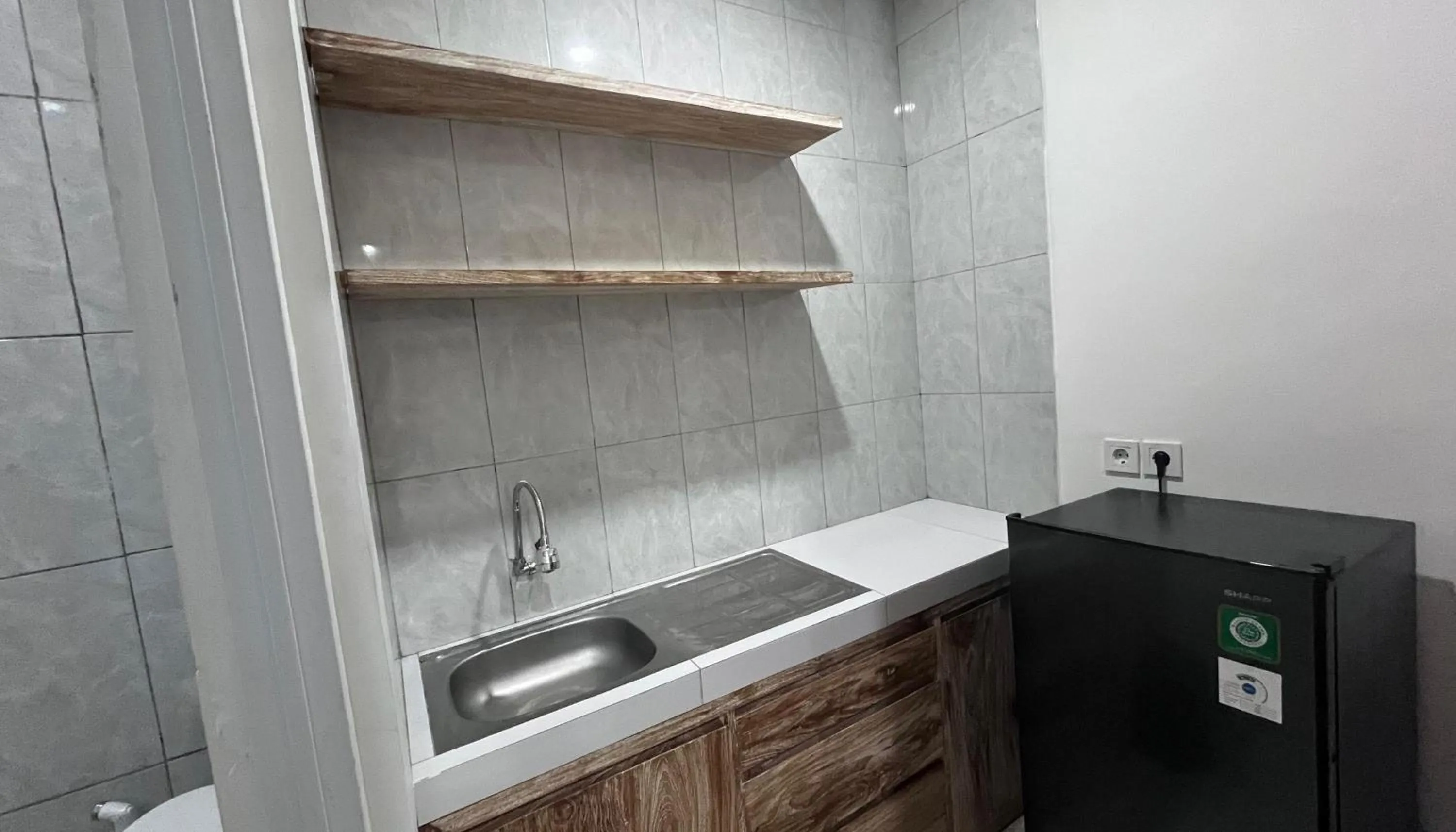 Kitchen or kitchenette in Maisaba Living Sibang Gede