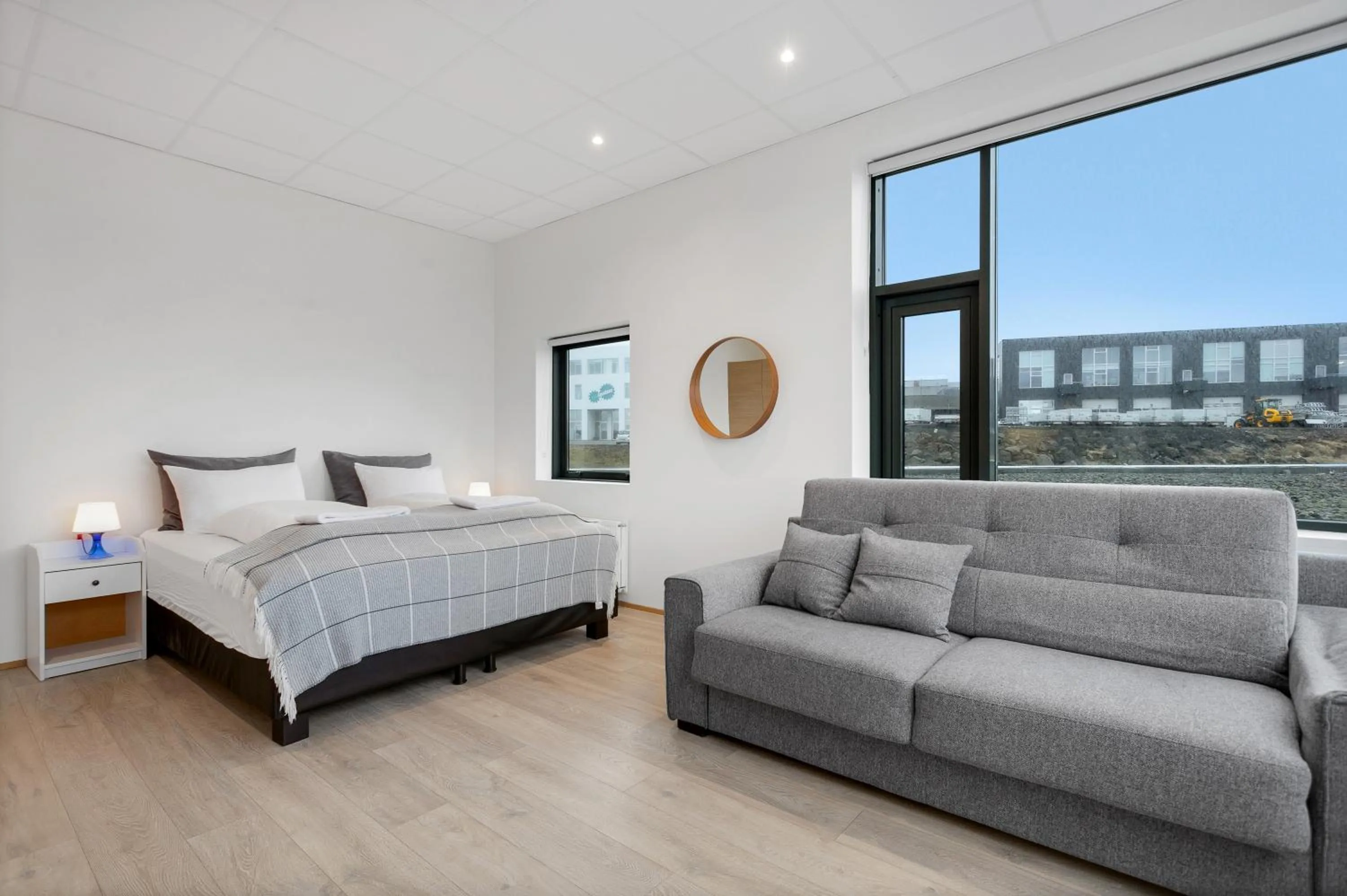 Bed in Blue Mountain Apartments by Heimaleiga