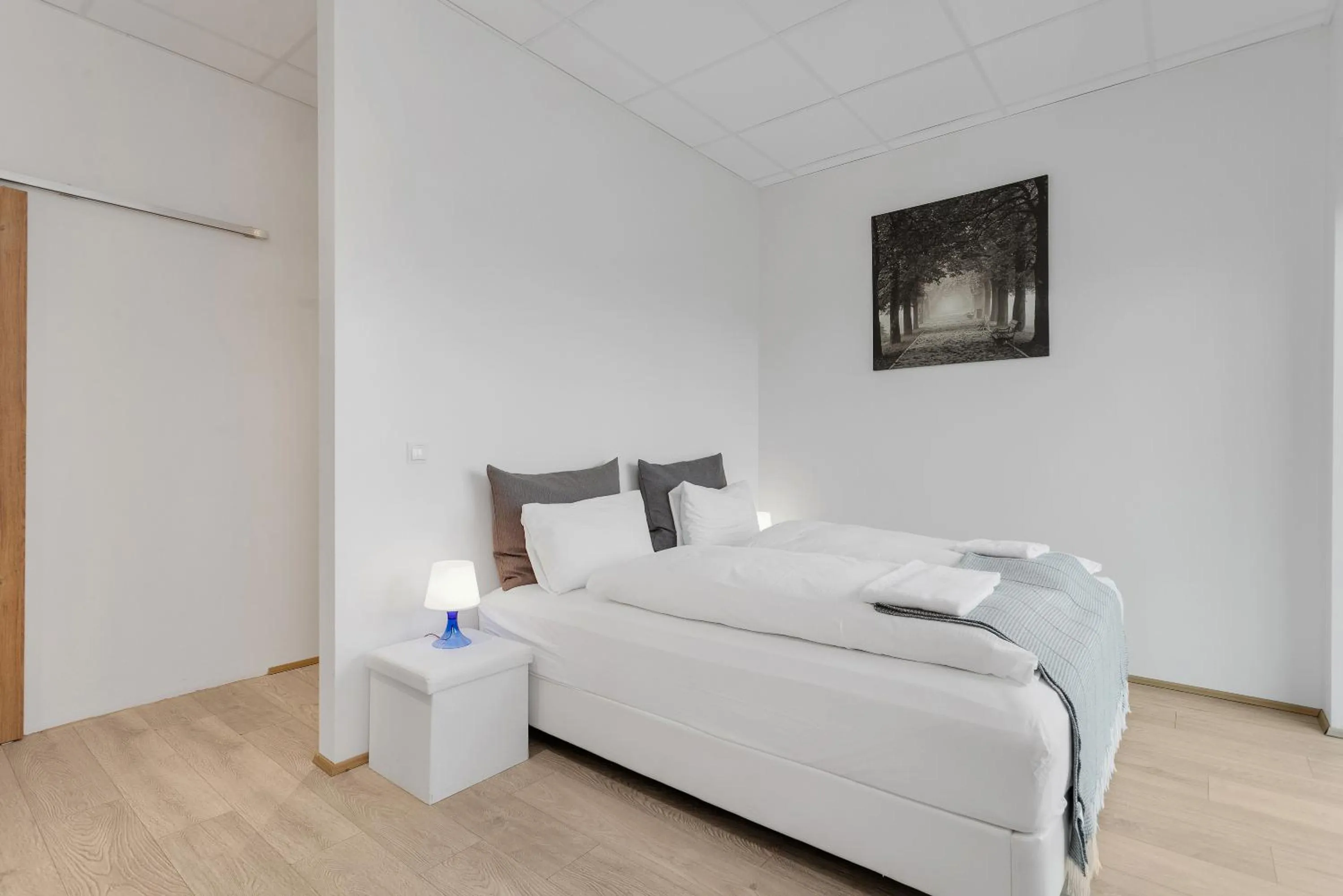 Bed in Blue Mountain Apartments by Heimaleiga