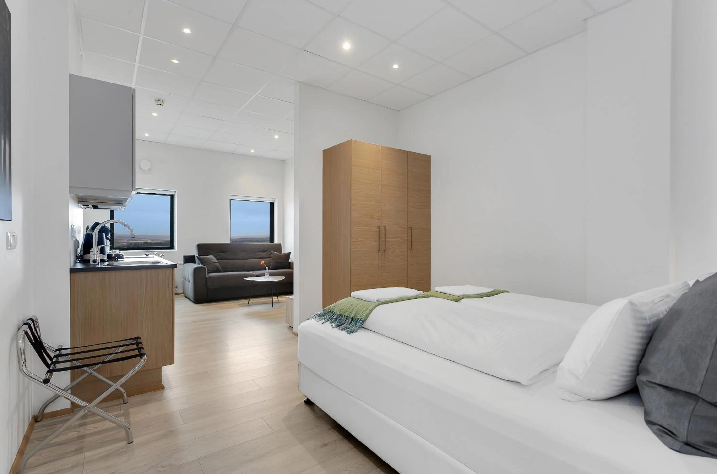 Bed in Blue Mountain Apartments by Heimaleiga