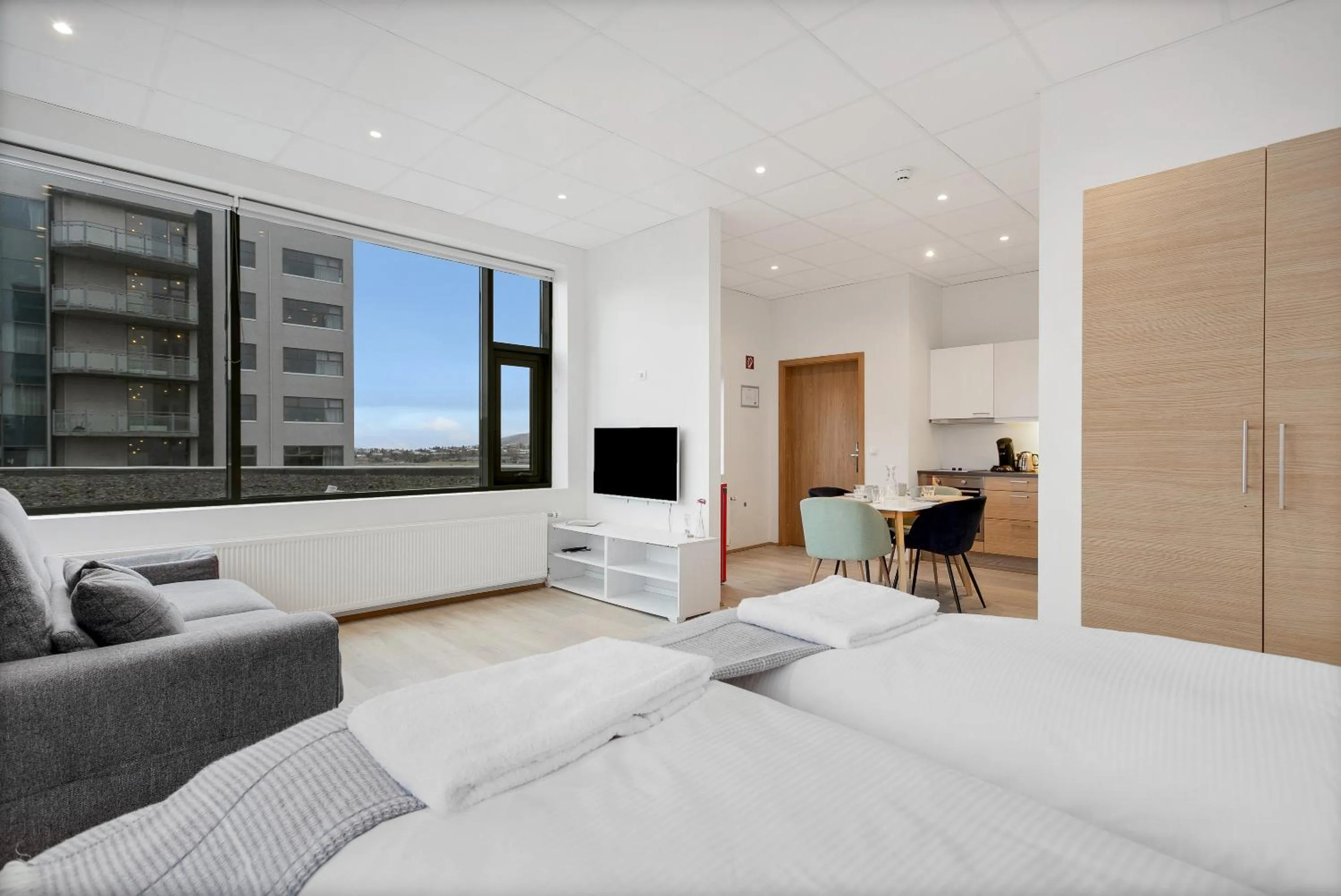 Bed in Blue Mountain Apartments by Heimaleiga