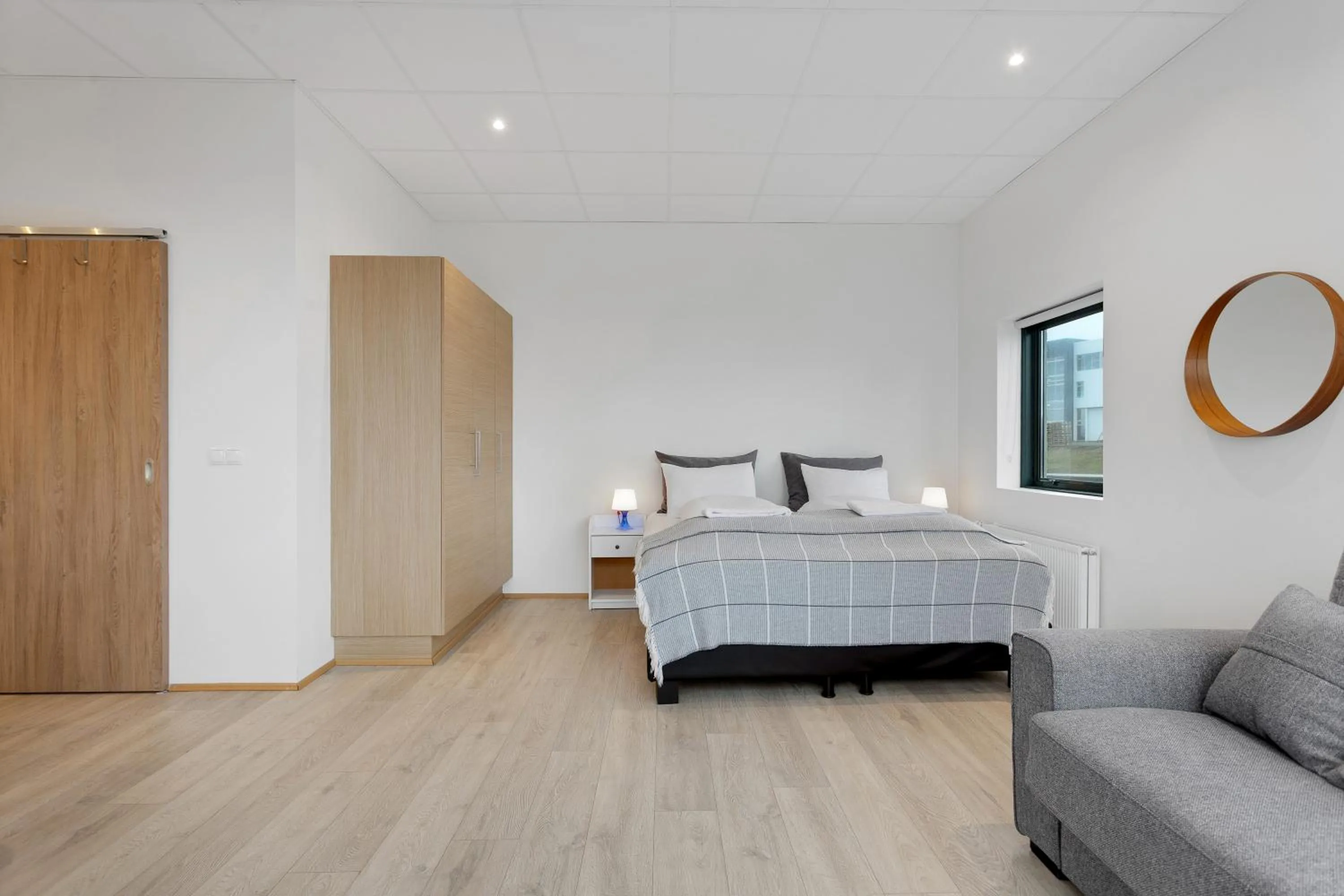 Bed in Blue Mountain Apartments by Heimaleiga