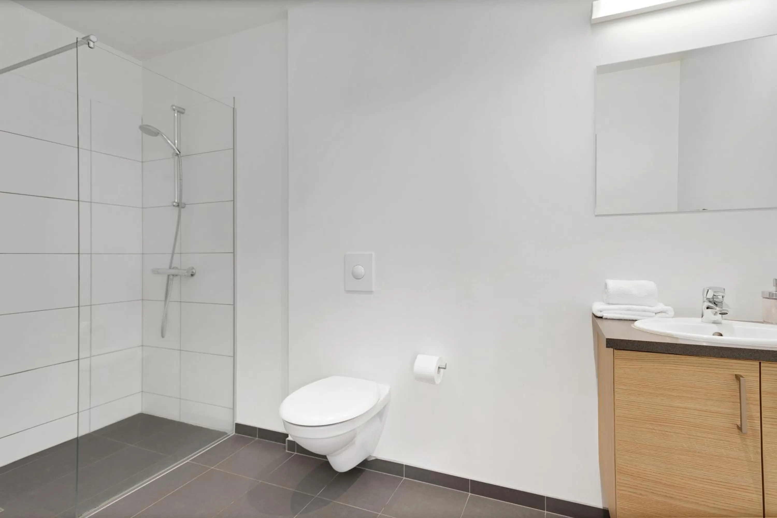 Shower in Blue Mountain Apartments by Heimaleiga