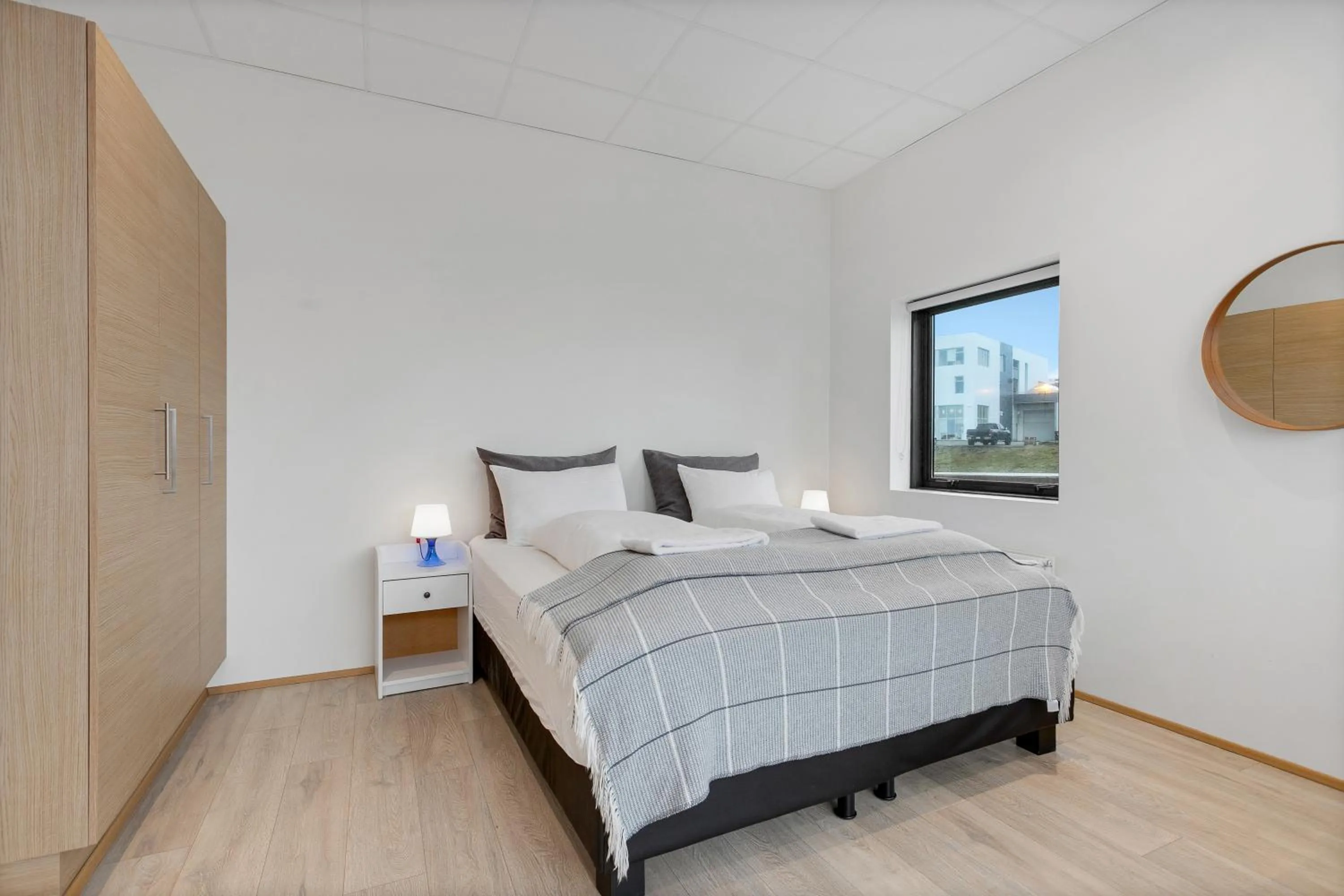 Bed in Blue Mountain Apartments by Heimaleiga