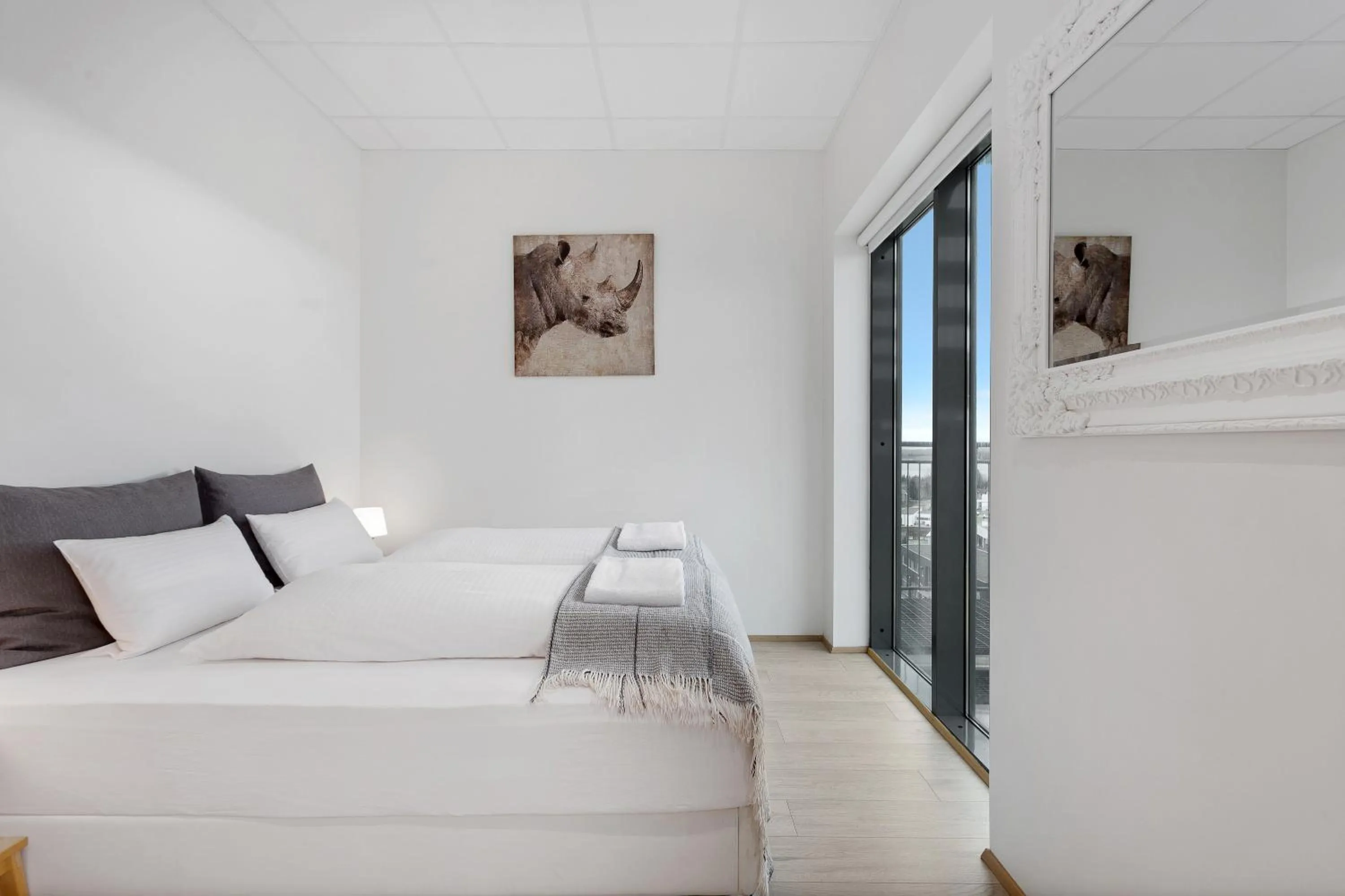 Bed in Blue Mountain Apartments by Heimaleiga