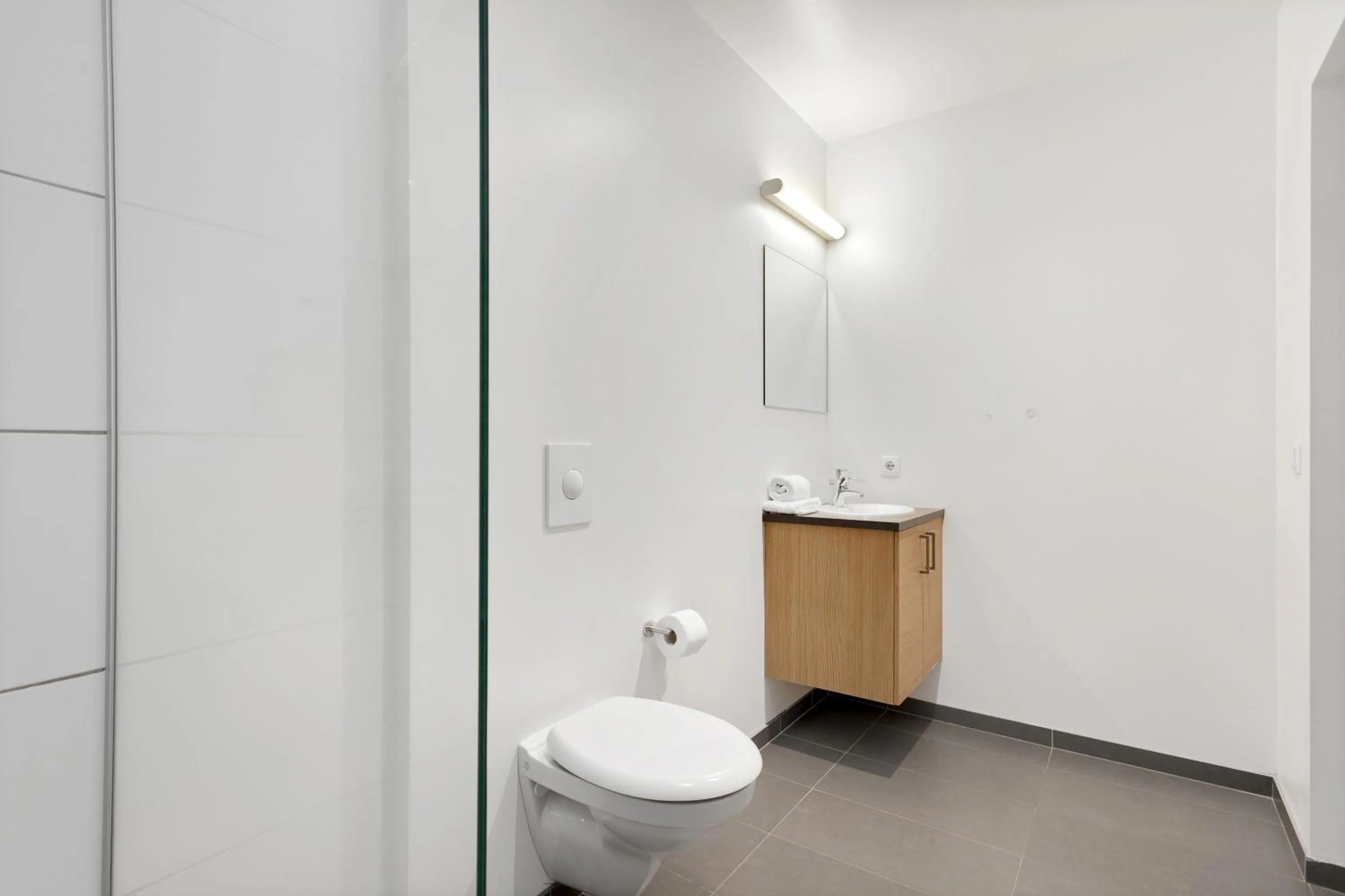 Toilet in Blue Mountain Apartments by Heimaleiga