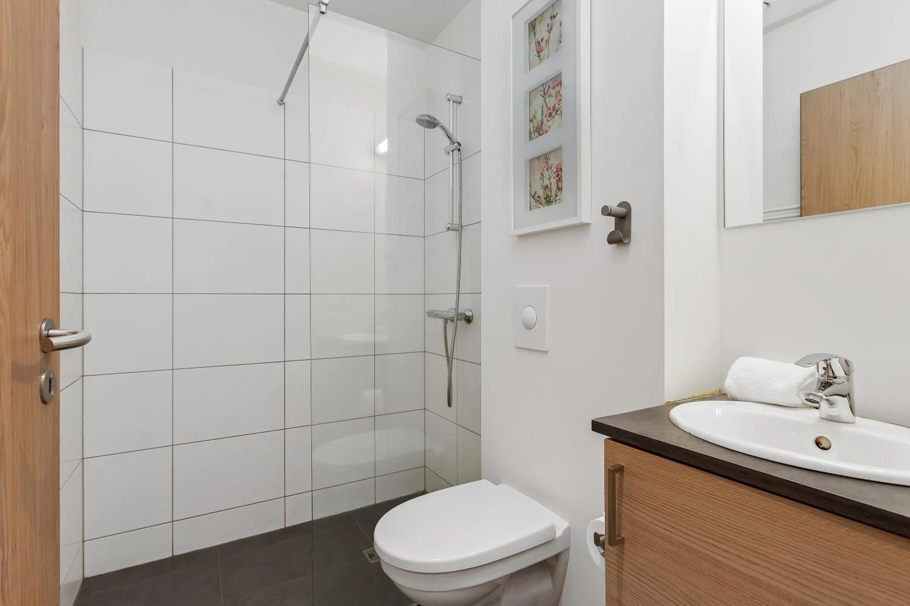 Shower in Blue Mountain Apartments by Heimaleiga