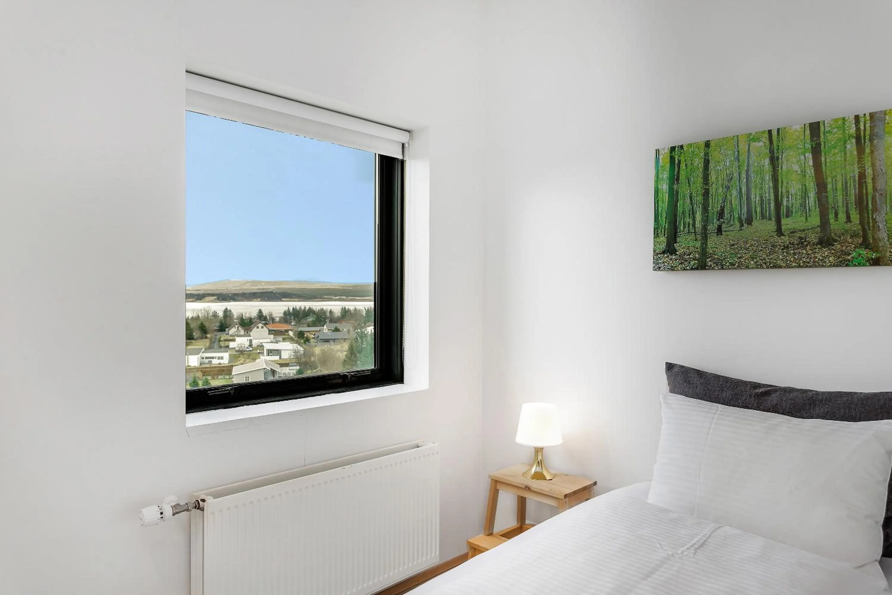 Bed in Blue Mountain Apartments by Heimaleiga