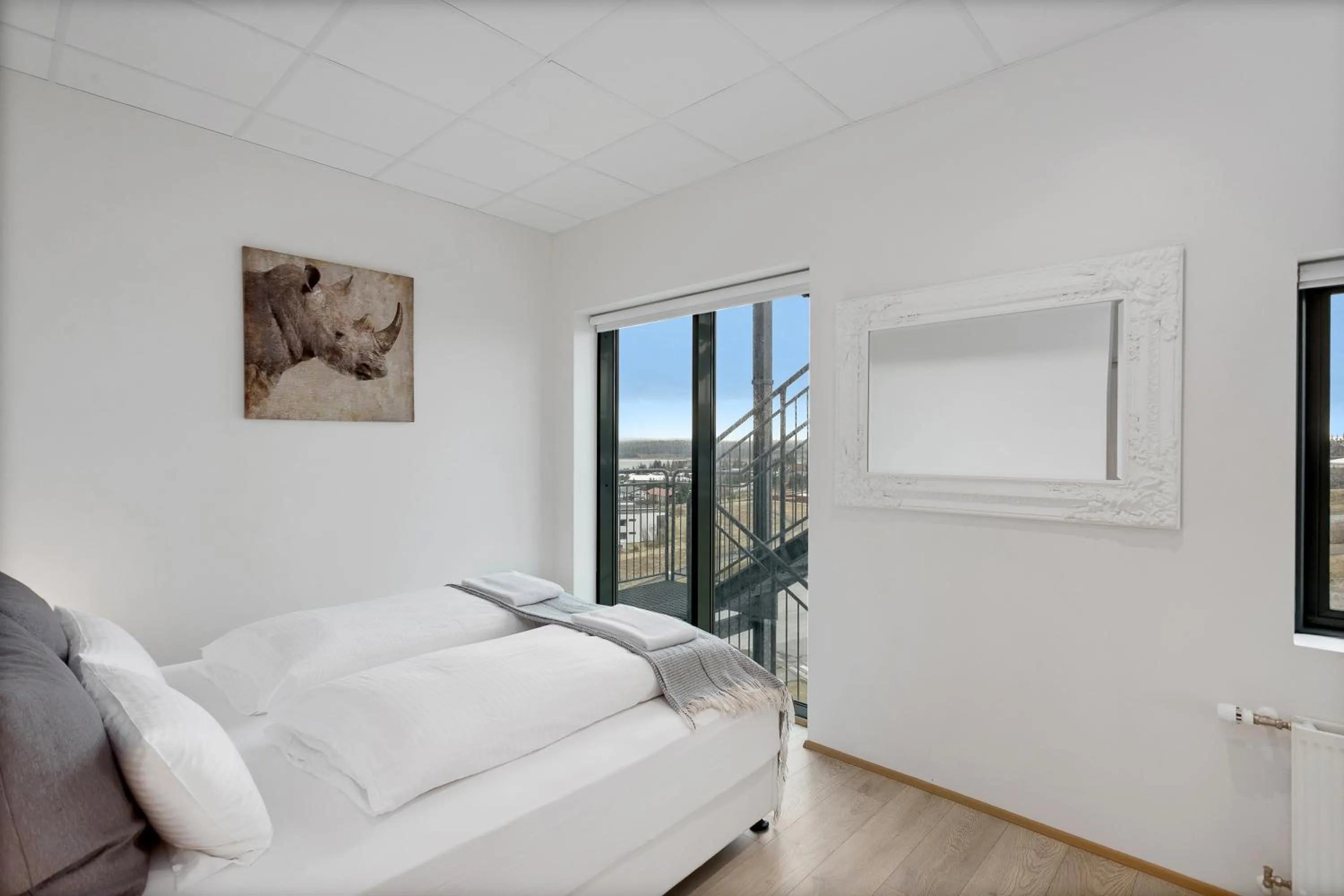 Bed in Blue Mountain Apartments by Heimaleiga