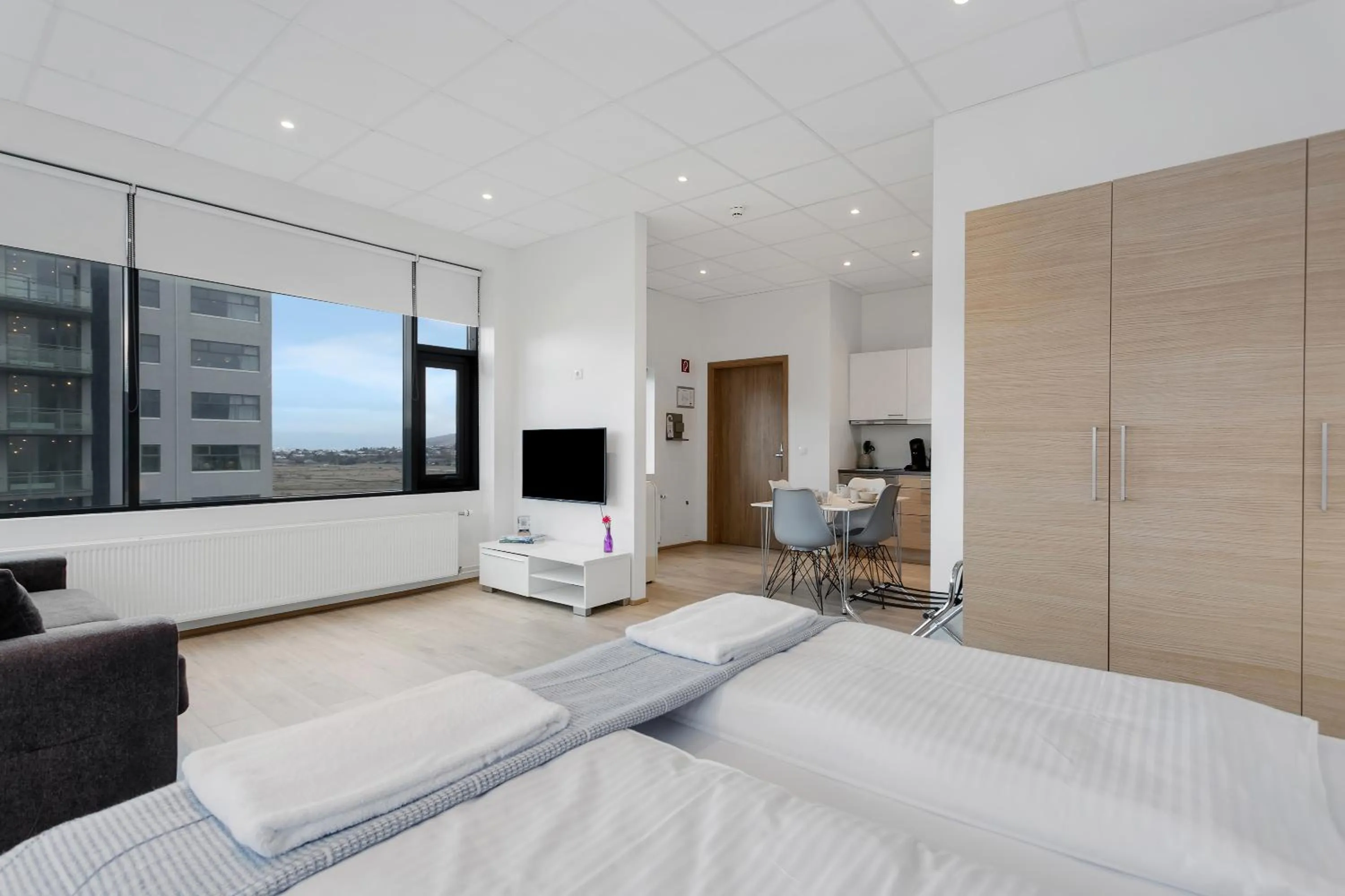 TV and multimedia, Bed in Blue Mountain Apartments by Heimaleiga