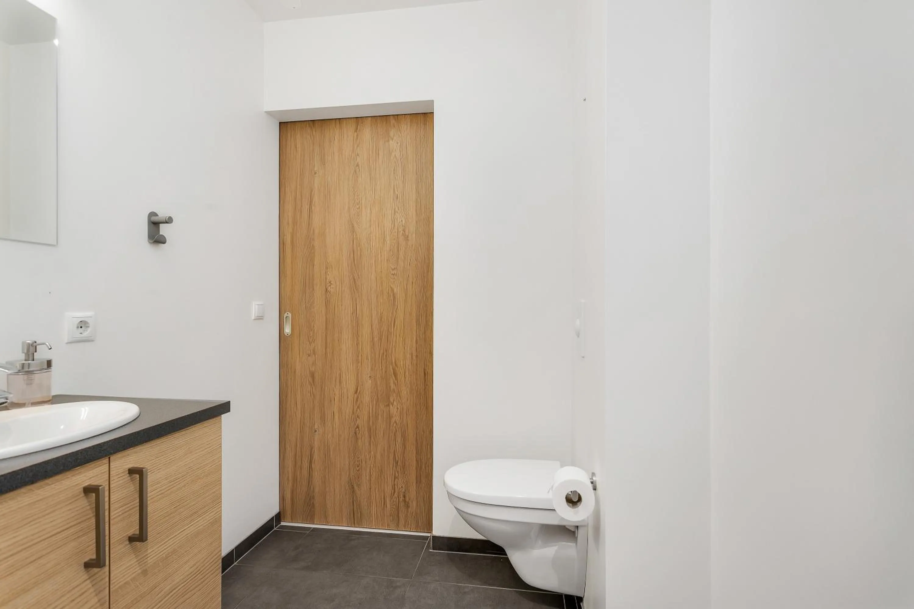 Toilet in Blue Mountain Apartments by Heimaleiga