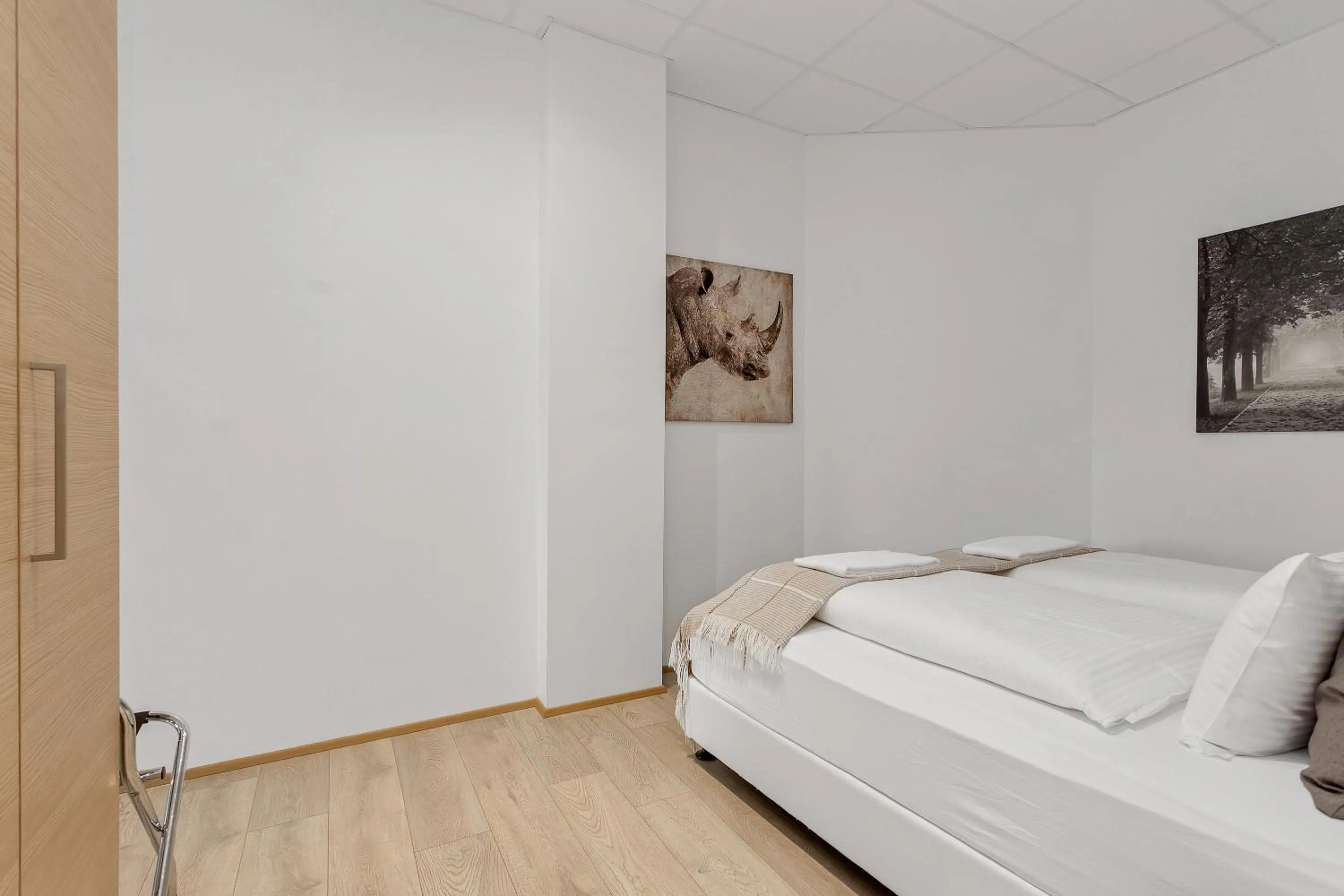 Bed in Blue Mountain Apartments by Heimaleiga