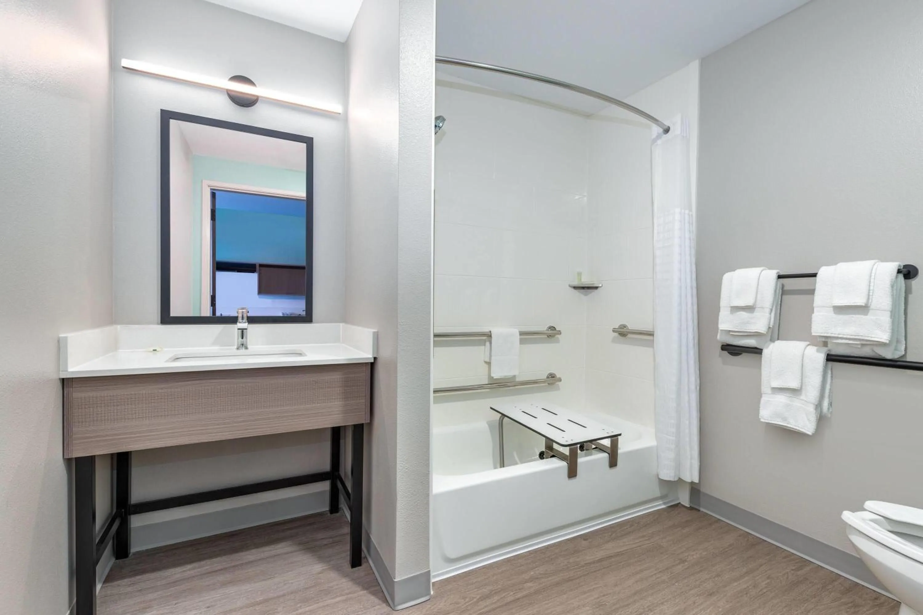 Bathroom in ECHO Suites Extended Stay by Wyndham Dallas Plano Richardson