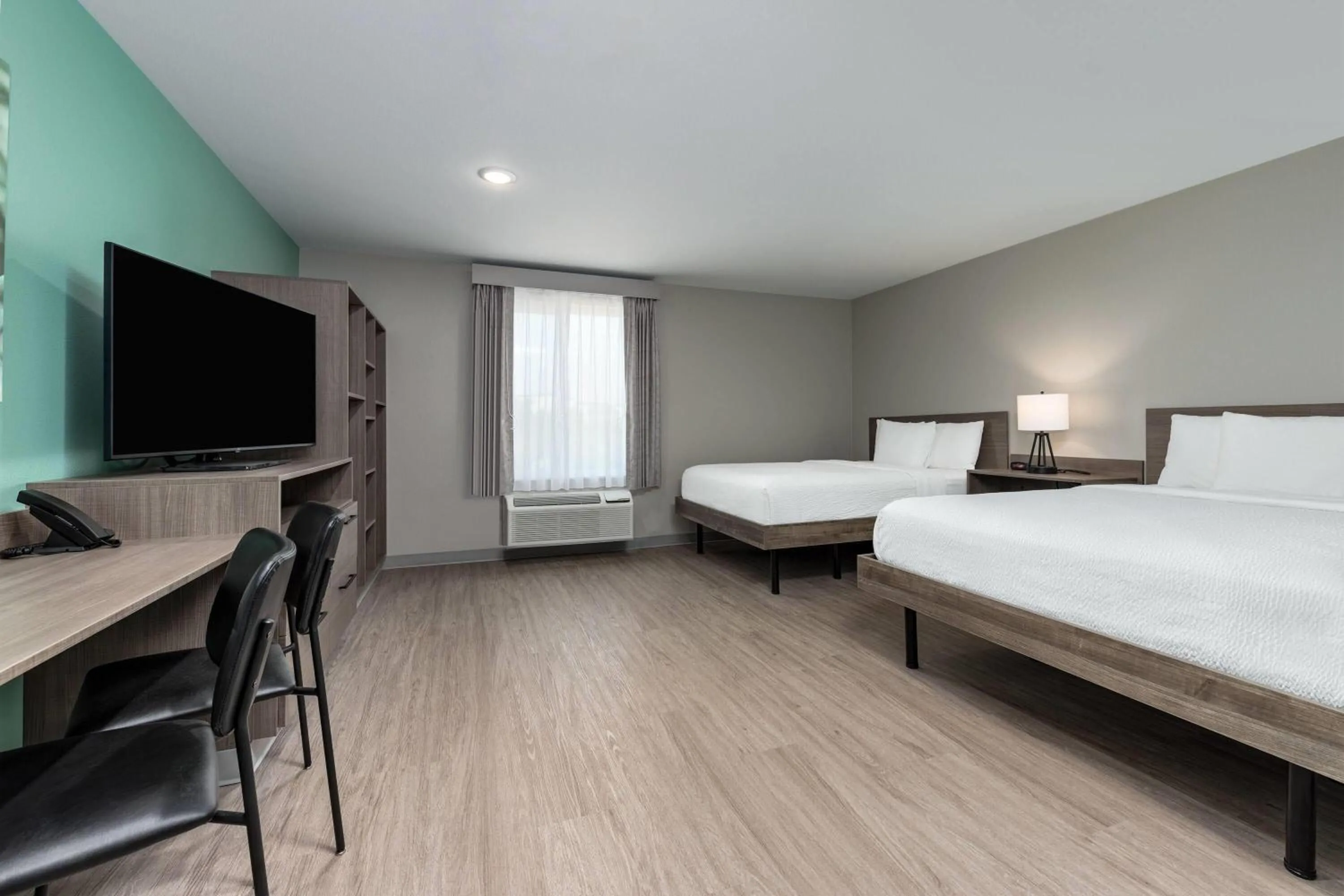 Photo of the whole room, Bed in ECHO Suites Extended Stay by Wyndham Dallas Plano Richardson