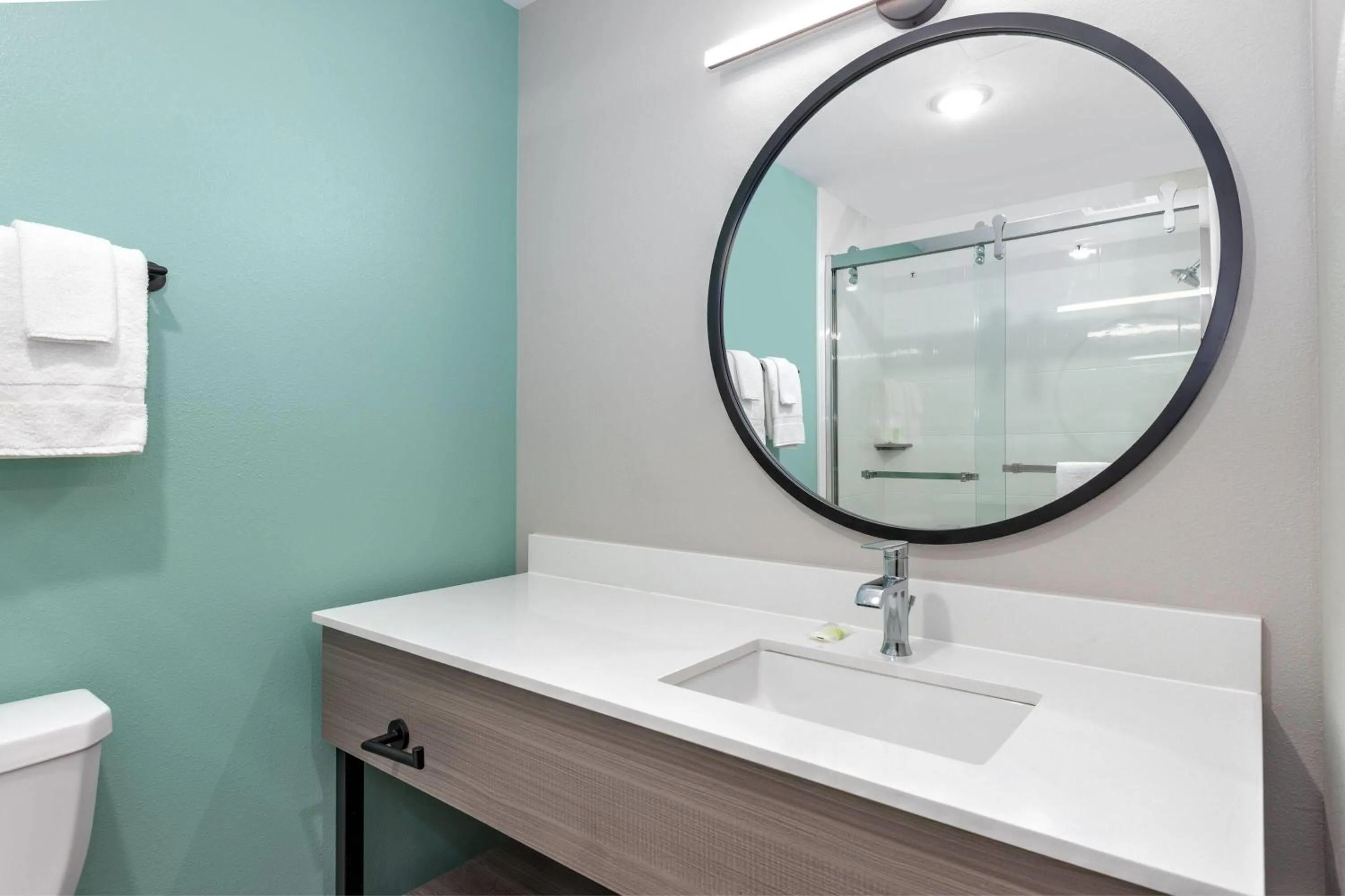 Bathroom in ECHO Suites Extended Stay by Wyndham Dallas Plano Richardson