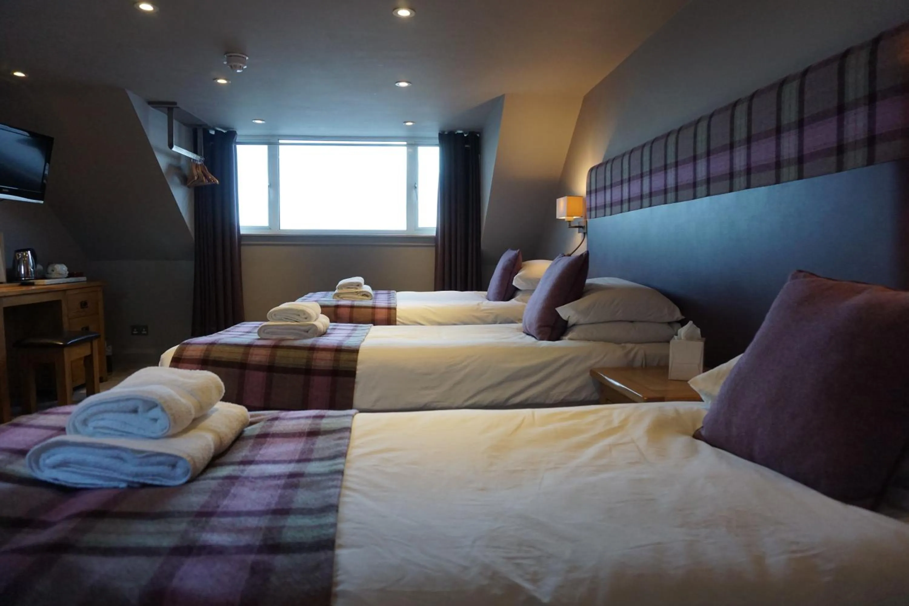 Bed in Lochside Hotel