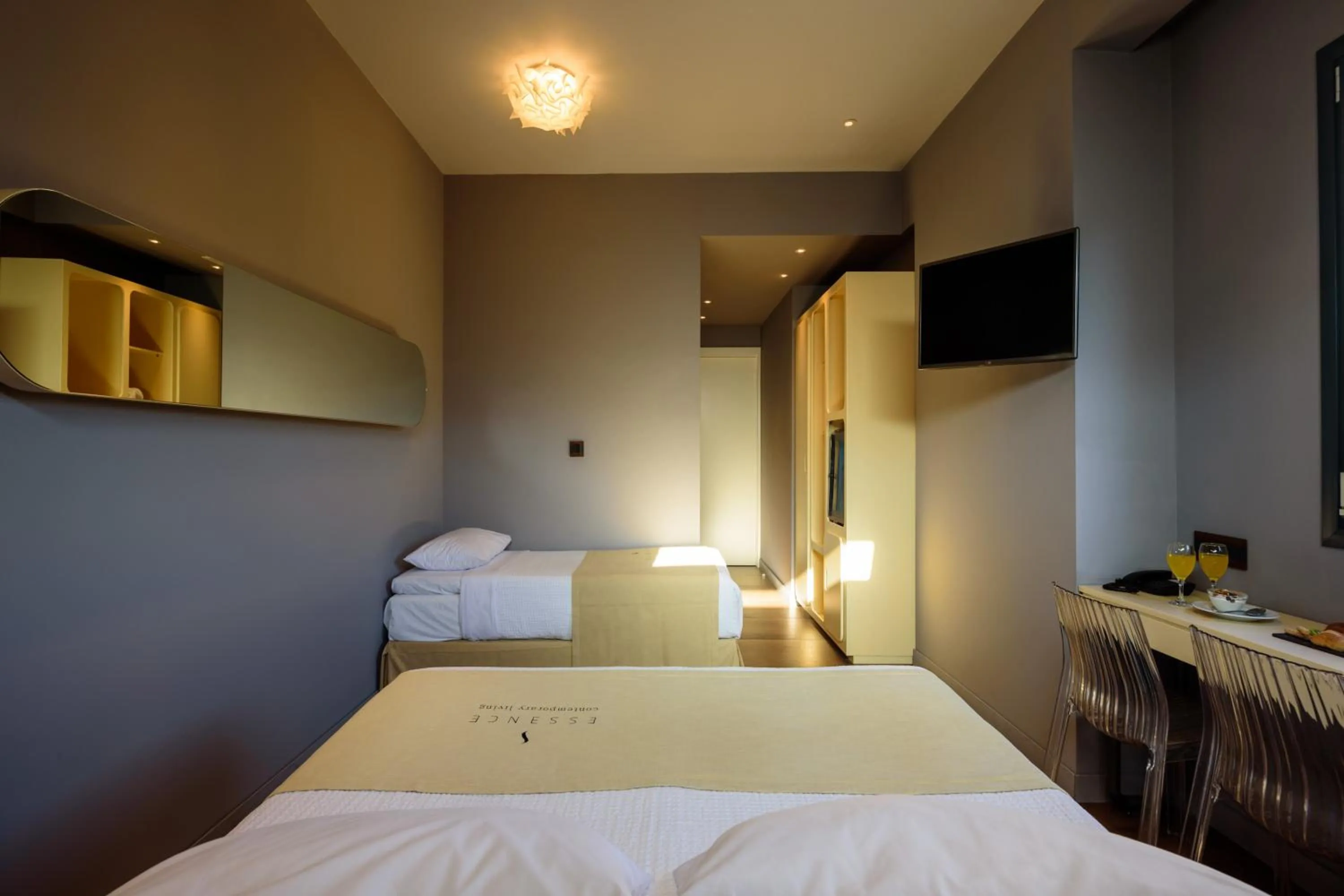 Bed in Essence Hotel