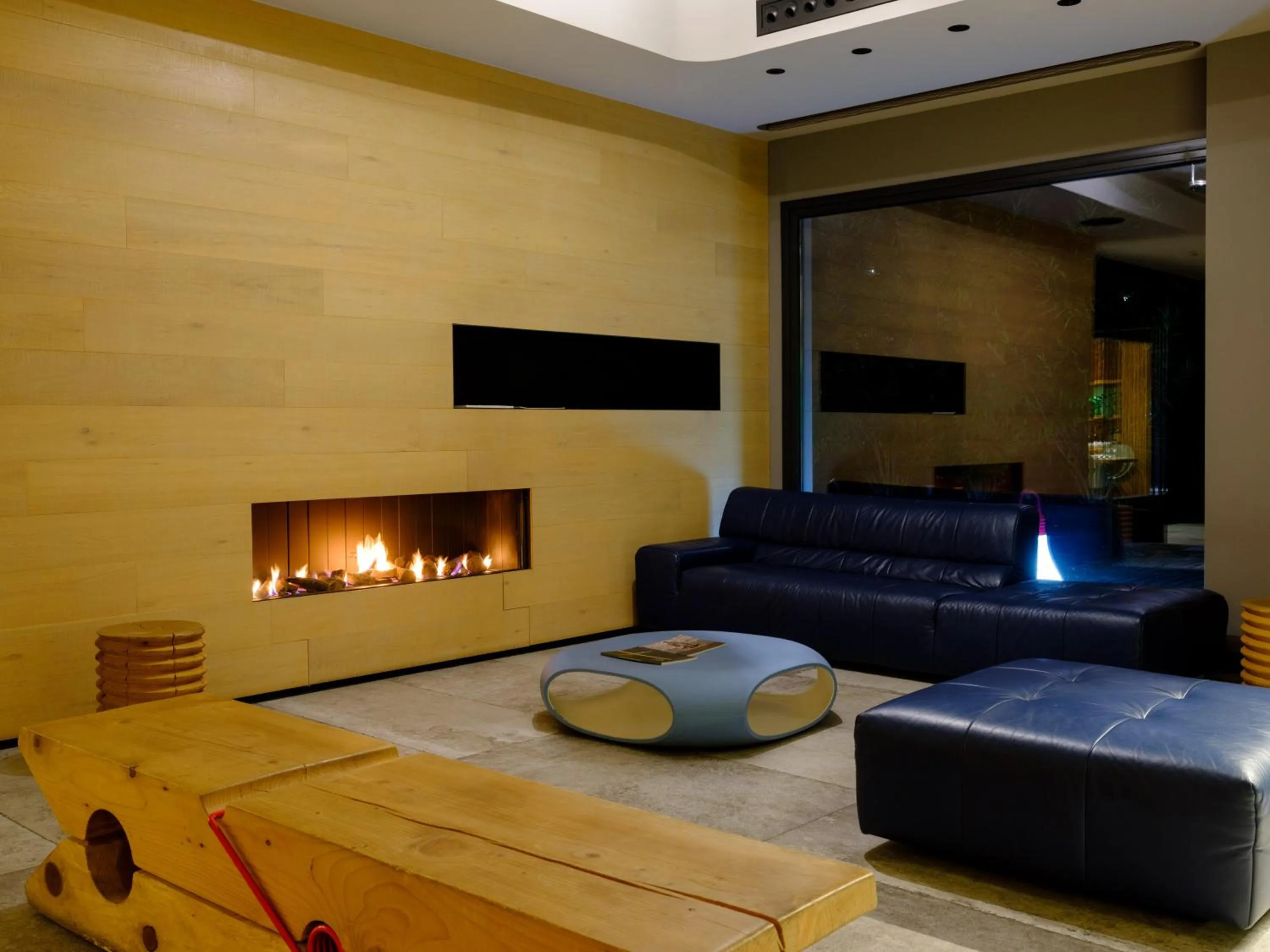 Communal lounge/ TV room in Essence Hotel