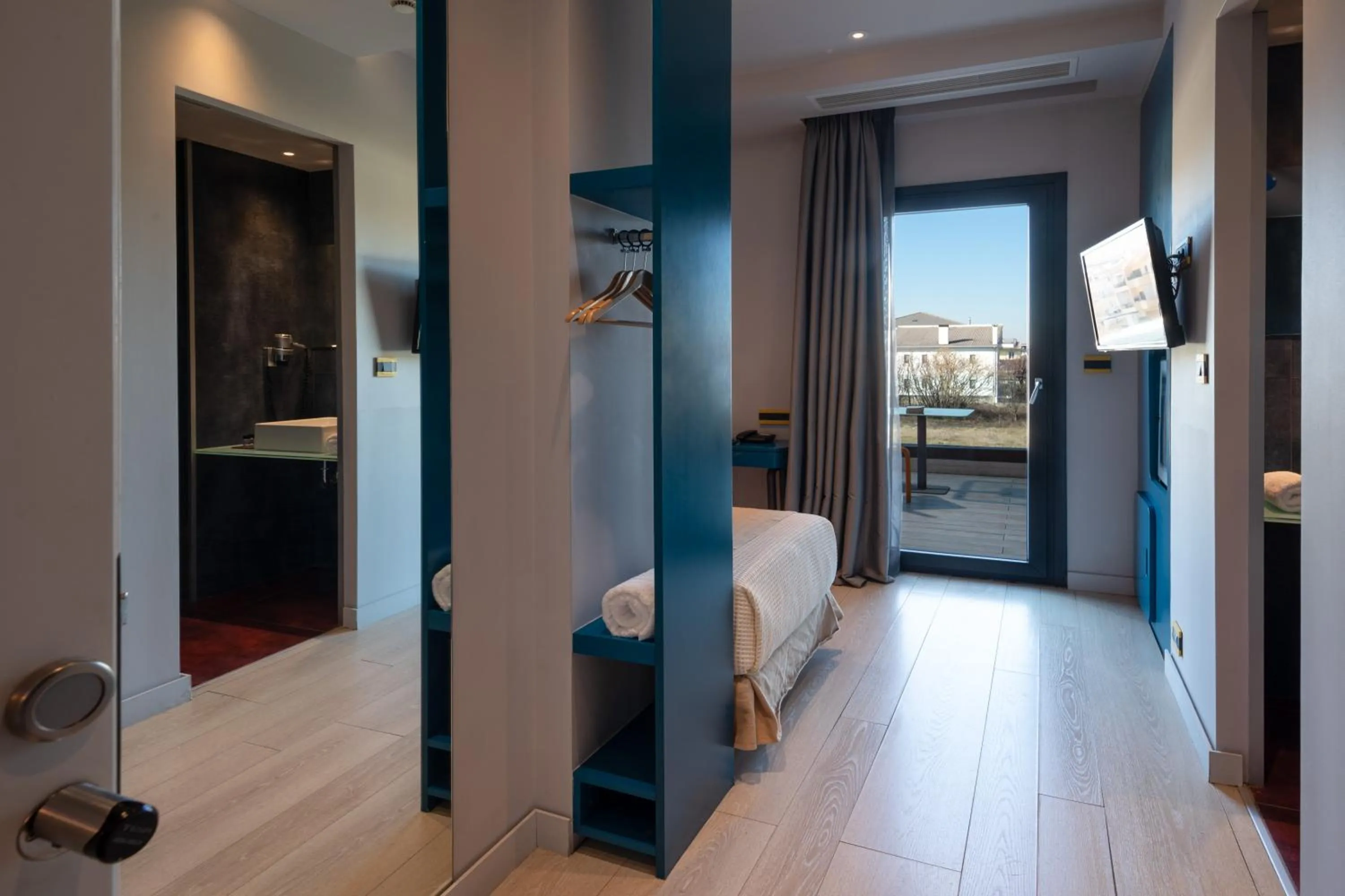 Bed in Essence Hotel